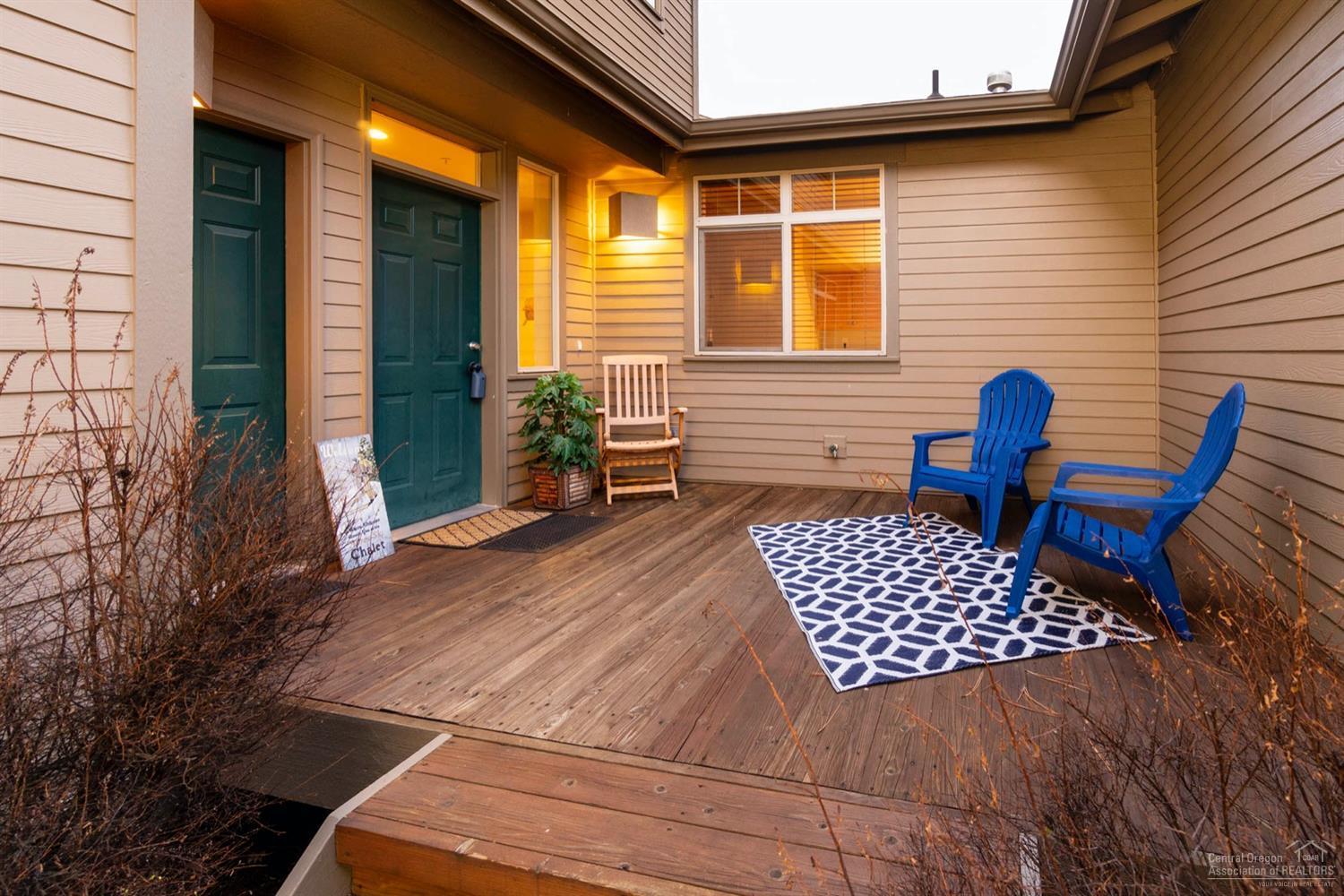 Widgi Creek Townhome has separate Lock-Out Suite with Private Entrance for those looking for potential Vacation Rental Income. Open Spacious Floorpan with Vaulted Ceilings and Walls of Glass allowing Wonderful Natural Light. Great Room has Raised Hearth Stone Fireplace which is open to the Kitchen and Dining Area. Spacious Kitchen has Center Island, Cabinets Galore, New Stainless, Steel Dishwasher and Stove. Downstairs are 2 en-suites and Upstairs is the 3rd En-Suite with an Open Loft Area. Enjoy Outdoor Living on your Expansive Deck and take a Dip in the Hot Tub. This is the perfect Lock-N-Go Home, whether it's a Primary Residence, 2nd Home on Vacation Rental. HOA Covers Roof, Siding, Snow Removal, Insurance, Trash, Sewer, Water and Use of the Newly Remodeled Clubhouse, called the Lodge.   A must to see!