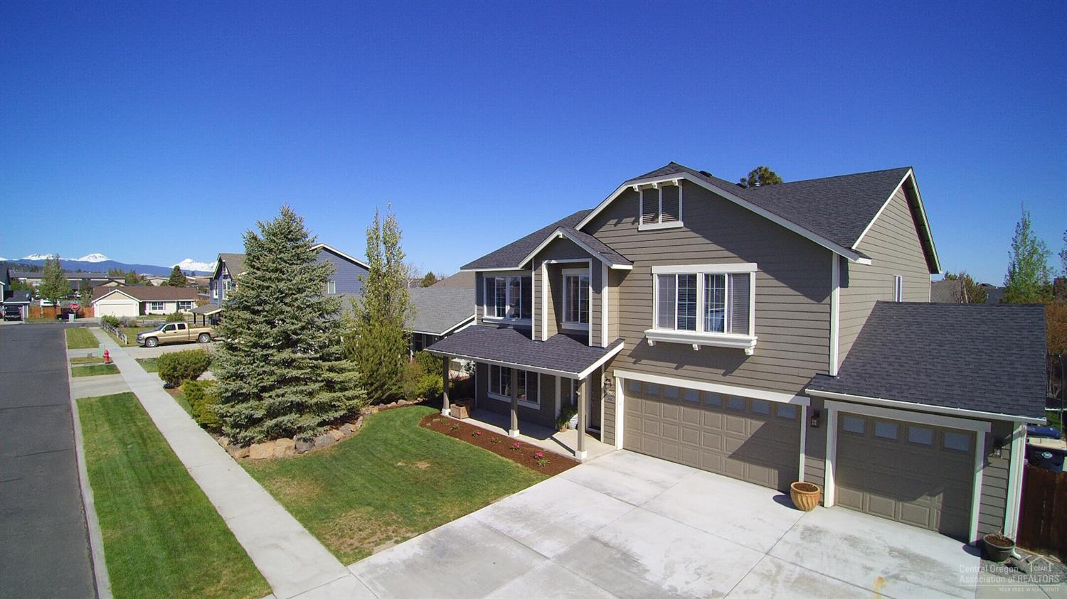 Location, Views, Privacy! This stunning Eastside home has it all. New landscaping, private backyard, and spacious patio make this the perfect home for entertaining or relaxing outside. Hard to find 4 bedroom home with 3 spacious living areas and nice finishes. Smart lighting throughout, hardwood floors, and recently updated bathrooms await you. You'll also enjoy the 3 car garage and tons of parking. RV parking is possible. Lots of storage & built-ins to keep you organized. Great neighborhood. See it Today!
