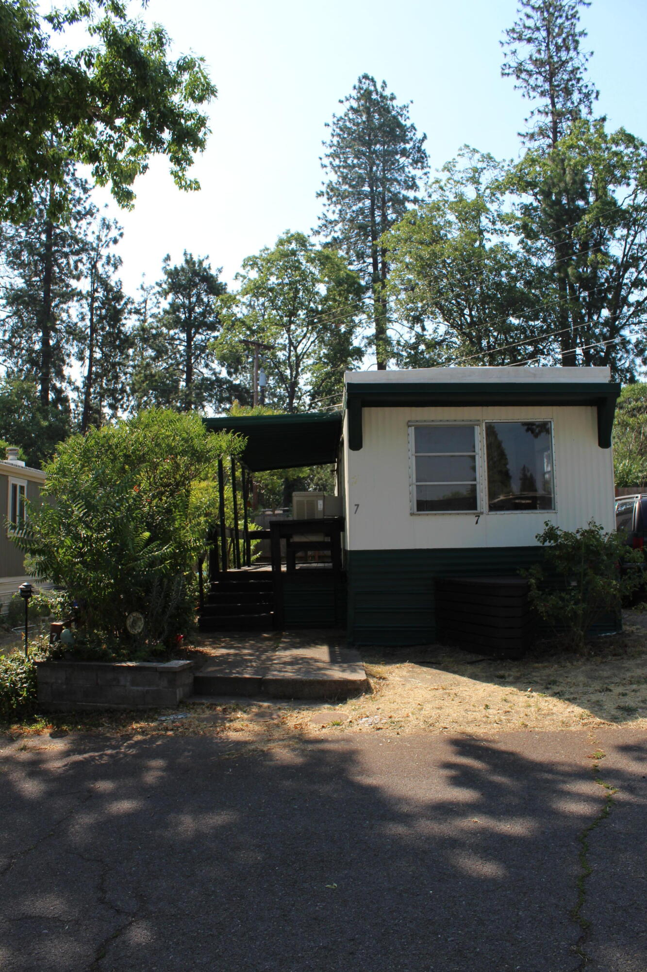 Cute and Quaint 2 bedroom, 1 full bath mobile in an all age park.  Home has a gas furnace forced air, window A/C unit, laminate flooring, carpet in bedrooms.  Bathroom offers a tub/shower combo.  Fridge and range/oven included.  Nice covered front Porch for outside living with small yard area.    Park has onsite laundry facilities and check with park for pet policy.  Mobile is being sold as-is.
 ___________________________________________