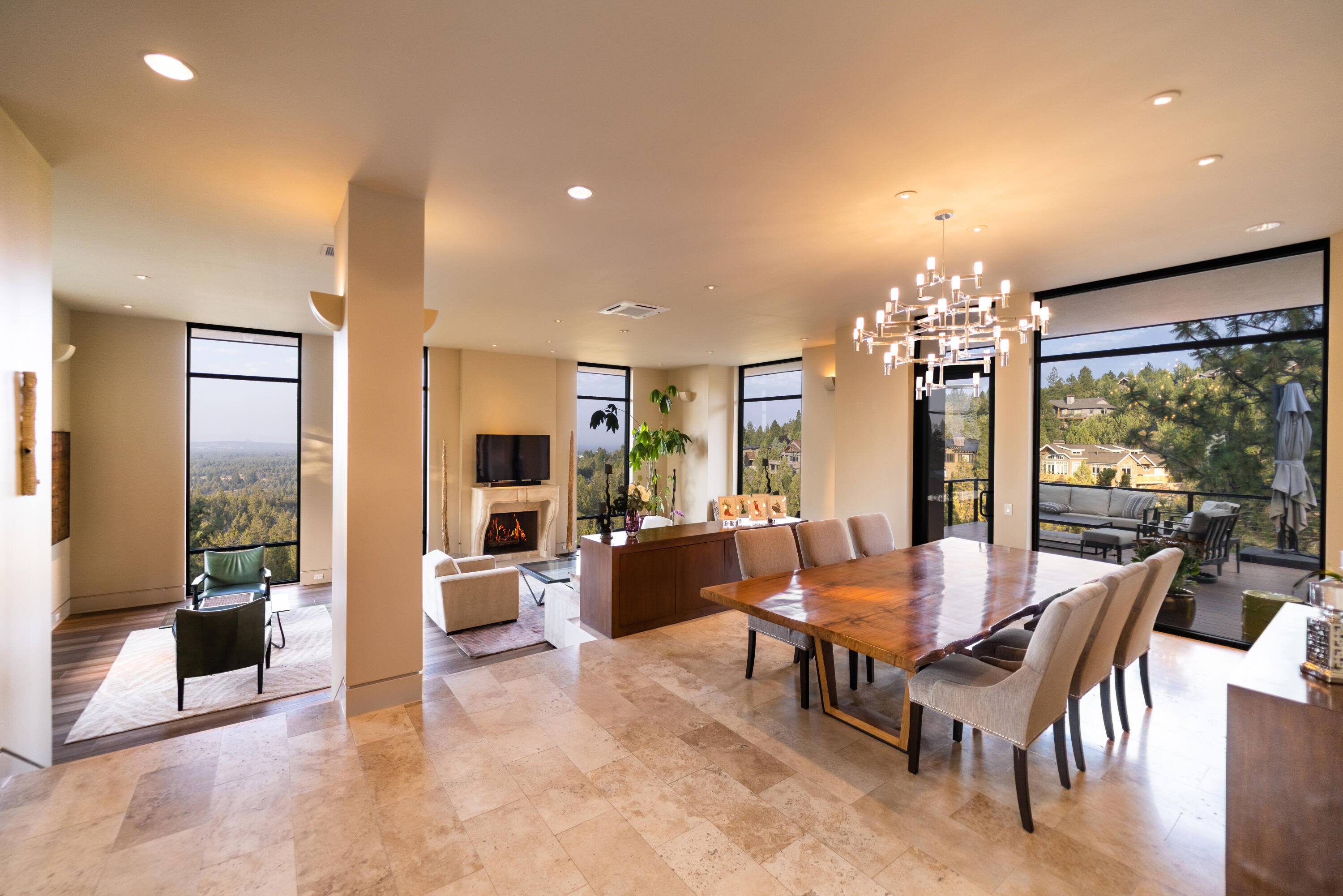 This stunning timeless modern designed home sits on a 1.29 acre lot surrounded by dedicated open space that can not be built on which offers the ultimate privacy. Top of the line (ICF) construction,Ecostar 100% recycled rubber roof tiles,two zone hepa filters (American Lung Assoc approved), exceeds Earth Advantage guidelines. 2 primary suites, European showers, custom stone mantels, Ceasarstone slab counters, powder w/ Italian plaster walls. Architectural low voltage lighting, remote solar shades.  Floor to ceiling windows provide sunrise to sunset stunning views and abundant natural light all day long. A chef's kitchen includes a Wolfe gas range, Sub Zero fridge and a butlers pantry with a second Bosch dishwasher. The kitchen island has a  custom granite slab waterfall countertop. The large upper deck is ideal for entertaining and outdoor living. On the lower deck a Bullfrog Hot tub and Custom Finnish Sauna, Main floor living, Radiant floors throughout including the large 3 car garage