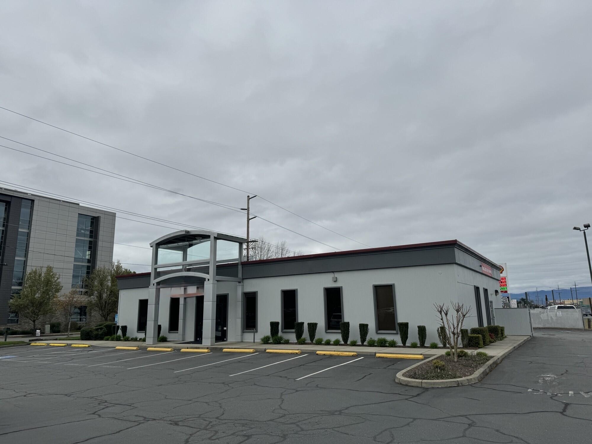 Tremendous HIGH traffic building on Redwood Highway with drive-thru lanes - now available! Approximately 3,648 SF building on an 0.62 acre lot. Former Rogue Credit Union branch building that has been meticulously upkept. Property includes a huge electronic monument sign and is situated prominently between Redwood Highway and Union Avenue. there are three drive-thru lanes and 28 parking spaces.