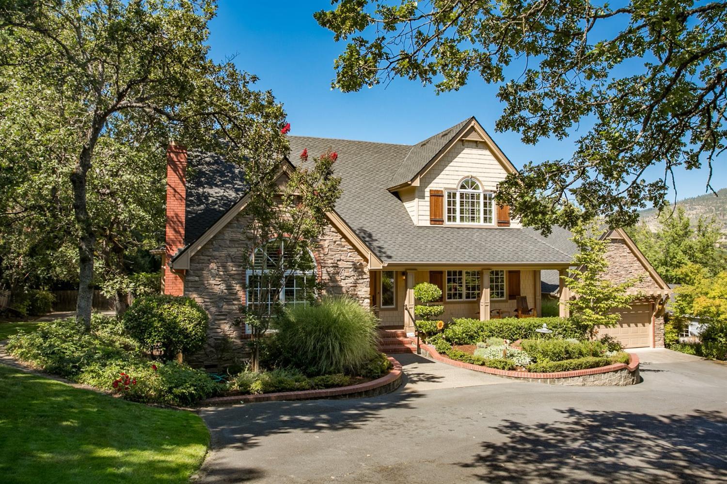 Stunning country style home in desirable E. Medford location close to Rogue Valley Country Club. Wonderfully detailed & extensively remodeled by Mike Pagnini in 2002/2008, this gorgeous home offers both formal & informal living with many custom features! Vaulted formal living rm w/stone fireplace & custom built-ins, in-home office, spacious kitchen w/Electrolux 6-burner gas range, slab Granite cntrs, breakfast bar & butlers pantry w/wine cooler. Family rm is light & bright & opens onto large tiered deck & well appointed backyard, lg formal dining ideal for entertaining, sitting rm & impressive private master ste w/custom bath including his & her vanities, clawfoot tub & custom walk-in closet. Wood floors, French doors, vaulted ceilings, custom woodwork throughout including extensive crown moldings, wainscoting & custom cabinetry. Designer colors & fixtures, accents of natural stone & ceramic tile, leaded glass details, inground pool, detached guest house w/poolside living & so much mor