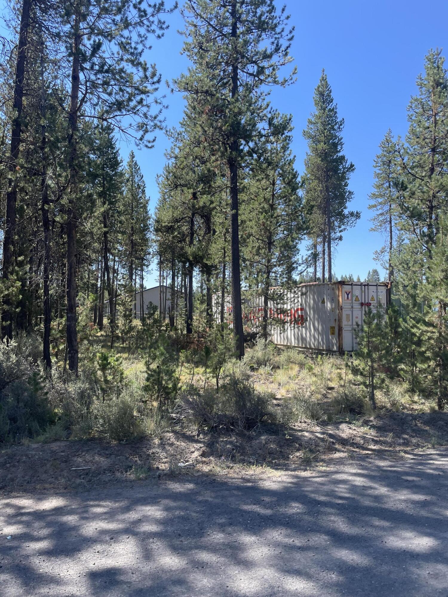 Most affordable flat almost 1/2 acre pole barn / recreational lot in Sunriver. 3 miles to all resorts & minutes to high lakes. Comes with membership to private boat launch, park & clubhouse on the big Deschutes River.  Ready to build your pole or horse barn and RV pads  ! Electrical conduit road crossing completed saving you $4,000. Many put wells in for water . No sewer or septic allowed like nearly all the lots in this area . Seller is semi retired builder and can oversee getting you bids and managing the build out of a pole  barn if desired for another $4,000. Price is non negotiable & courtesy to brokers .  Other pole barn lots that have come on market now are $75,000 to over $80,000. Hurry before the price goes up!