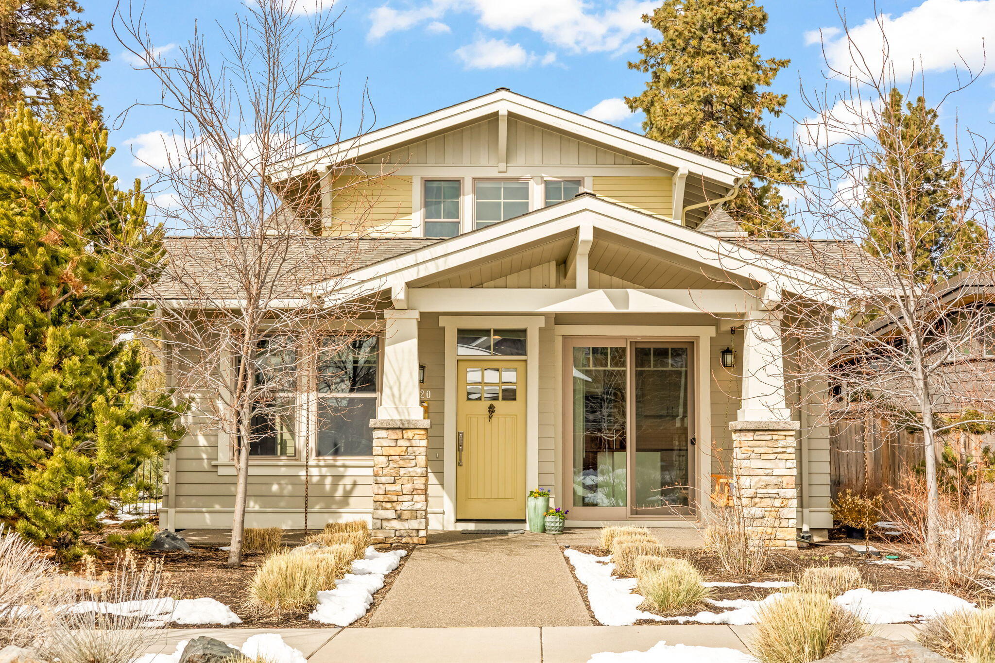 Prime Discovery Park location in NW Crossing! This beautifully crafted Greg Welch-built home is 1/2 mile of top schools, amazing local restaurants and Bend's Best Farmers Market. With Discovery Park as your backyard, enjoy a community garden, dog park, lake and scenic walking trails right outside your door. Inside, fresh paint enhances the bright, airy floor plan, while luxurious wool carpet adds warmth and organic comfort in the upstairs bedrooms. Natural light floods the home and the modern living space creates a striking contrast to the bright, open kitchen. The primary suite features sun-filled windows, walk-in closet with built-in shelving and a spa-like bath. Two spacious bedrooms offer an en-suite design with a shared shower. Enjoy multiple outdoor spaces, including a covered front porch and two patios. The oversized garage includes a 3rd bay for gear. Furnishings available! Don't miss this opportunity to own a stylish, home in one of Bend's most sought after neighborhoods!