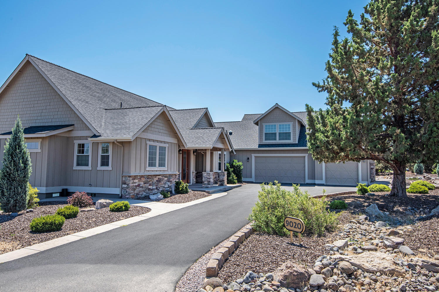Custom Eagle Crest home, with these features:
Three separate suites plus office/den.
Quality throughout with custom cabinets,  2 double fireplaces and granite counter tops.
private setting with deck, patio and courtyard.
Lovely landscaped yard has water feature.
2200 square-foot RV garage has work shop and three car parking. This beautiful home is located across from BLM trail system.