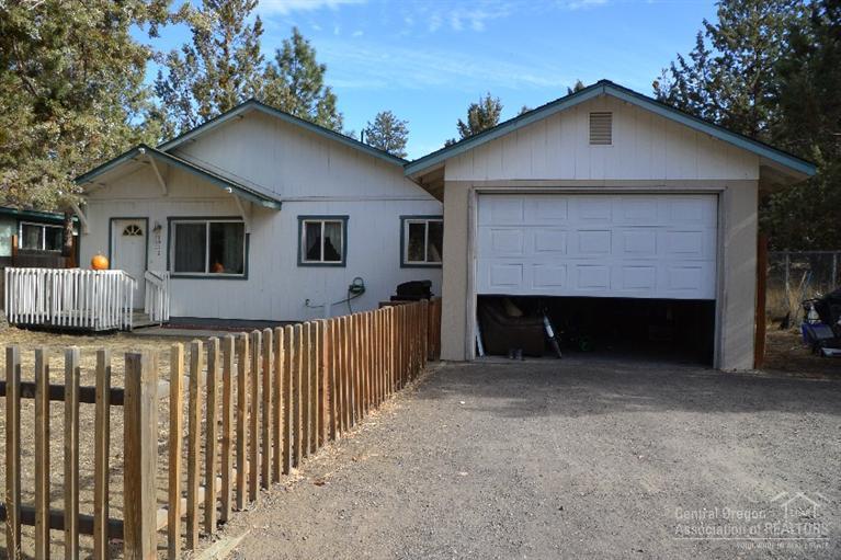 This single level home is located in NW Bend just two blocks from the Deschutes River, First Street Rapids Park and the River Trail. Easy access to downtown, the Old Mill District, shopping and the park way. Features include a large .19 acre fenced lot, 4 bedrooms, 2 bathrooms, single car attached garage and boat/RV parking. Ready for your personal touch to call this place home.