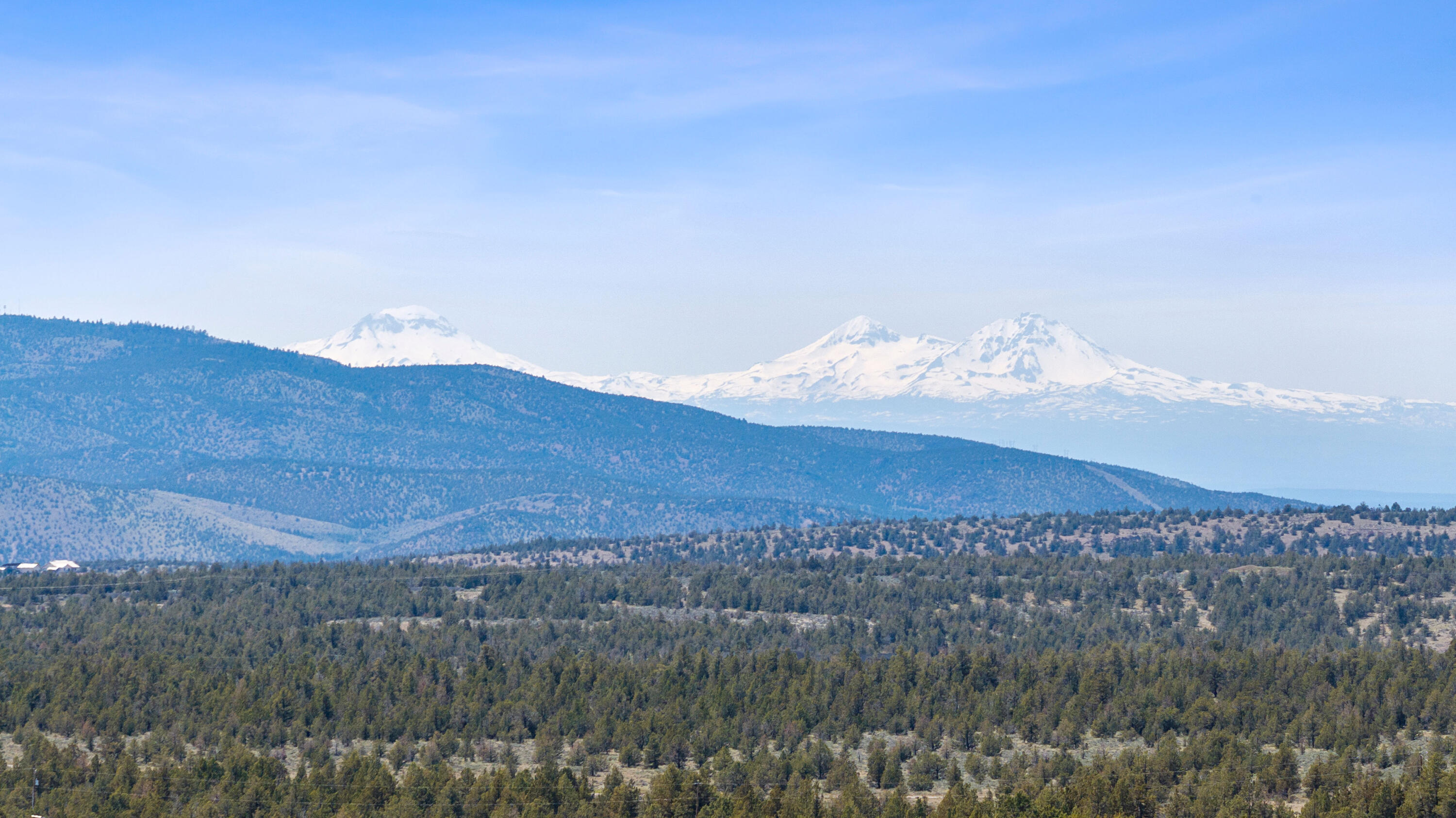 5 acre lot with stellar mountain views and has trees.  Power is to the lot line.  Has a road cut in to access the property.  Great development with no CC&R's or association fees.  Only about fifteen minutes to town.  Great place to build your home and enjoy the views!