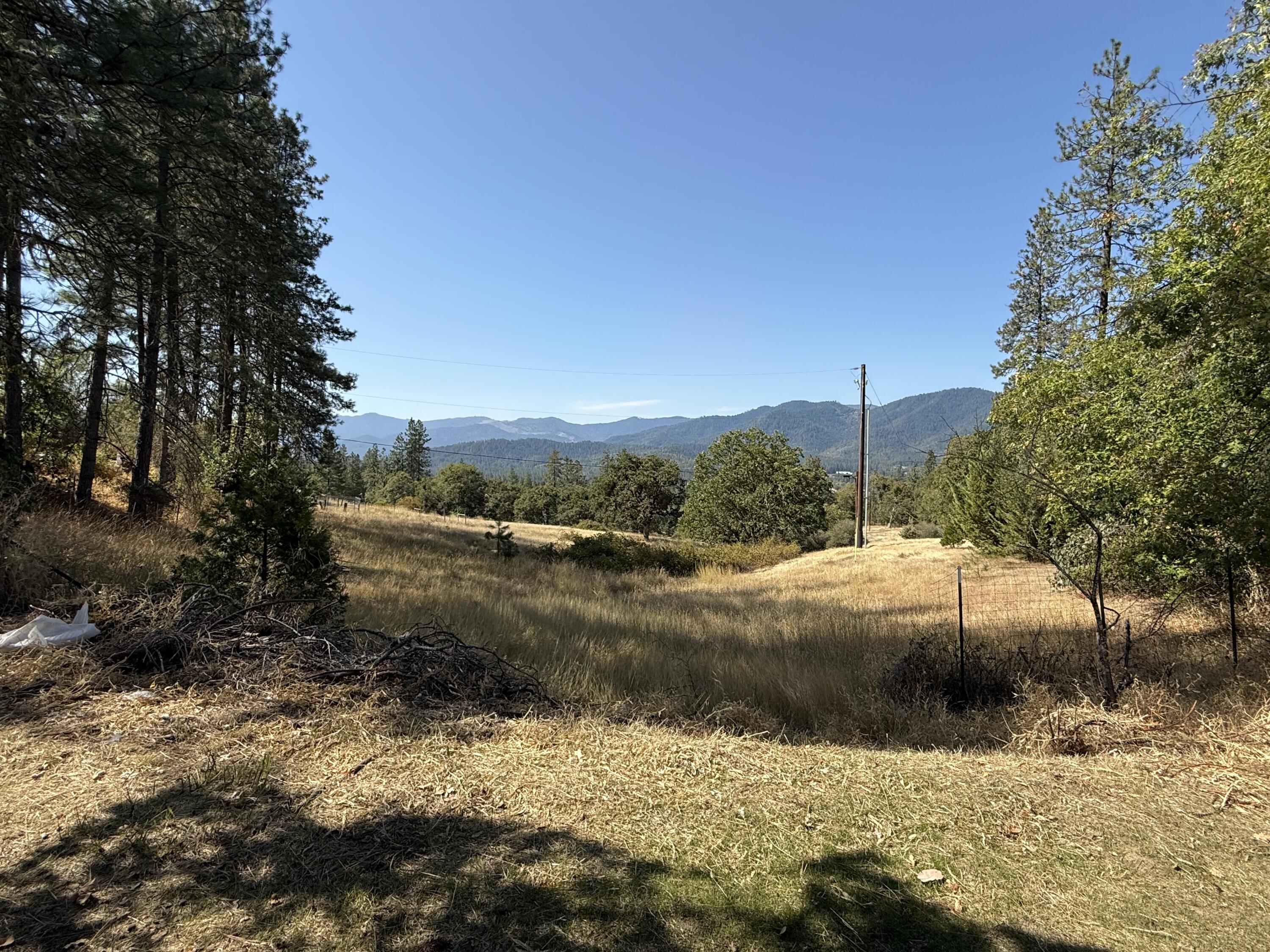 Pastoral and Mountain views from every location on this large acreage parcel. Super well built quaint home with a 2 car garage/shop and barn. Located up a country lane, sits way off of Williams Hwy, up Findley Rd. There is so much potential for animals and farming on this 37.71 acres of Exclusive Farm zoning. Property also features 3 large sheds, one set up as a reading/guest room and the other two have been used as large chicken coops. Recent water testing shows great well flow and water quality. The slightly sloping open pasture has been fenced and cross fenced. Large garden areas to reclaim. Seasonal pond and creek running through the pasture below. Seller is having deck repaired to qualify home for financing. Recently appraised at list price.