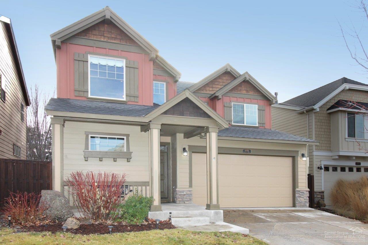 Charming Pahlisch built 2139 sqft, 2 story Sun Meadow home with 4 bedrooms & 2.5 baths, enjoy the private master on the main level. This lovely home features a vaulted great room with gas fireplace and slider to the fenced backyard, hardwood floors, tiled counters, stainless appliances in the kitchen with a breakfast bar and pantry. Fun community with a park and pool! From this location you are centrally located and just minutes from- everything!