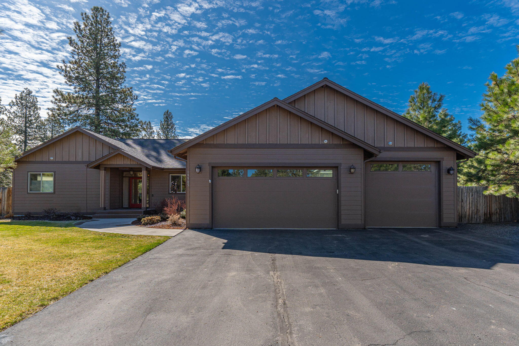 This single-level residence is a dream for those craving luxury, comfort, & functionality. Its meticulous attention to detail & numerous upgrades make it stand out. From the Chef-sized kitchen to the spacious primary suite, every aspect exudes both comfort & style. The well-thought-out layout, w/ excellent BD separation & 2nd en-suite, is perfect for multi-generational living or hosting guests. Unique features like ADA-compliant options & outdoor spaces cater to various needs, ensuring everyone feels at home. Furthermore, the property offers ample storage options, including a 3 car garage w/ workshop, detached 50'x25' RV garage, & an additional 30'x30' shop w/ office & bath. This property truly caters to hobbyists, craftsmen, or those simply needing more space. Conveniently located min away from shopping, trails & amenities, it offers both serenity & accessibility. Overall, it's a turnkey dream property that seamlessly blends all things needed to accommodate diverse lifestyles & needs