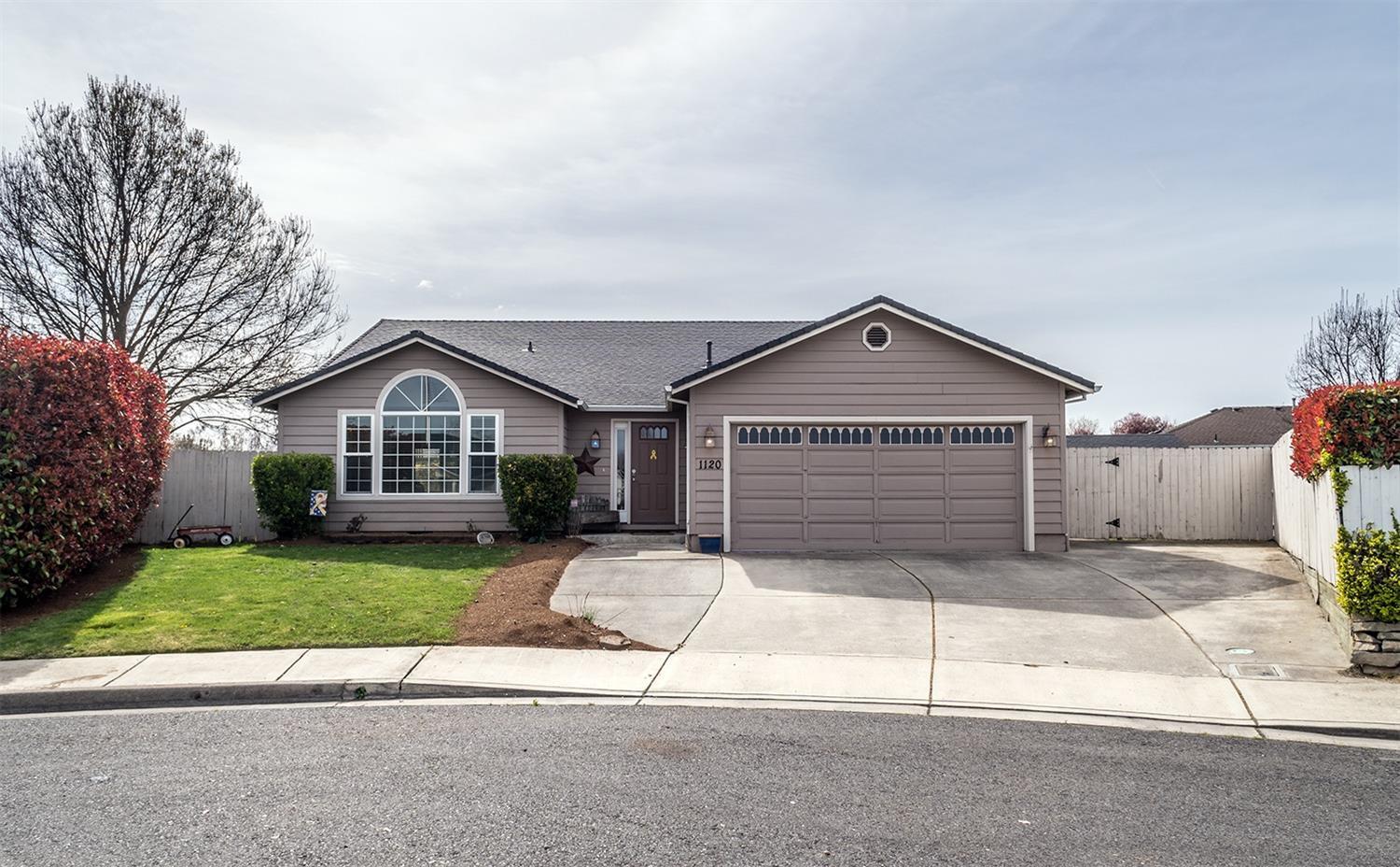 What an amazing home! From the moment you walk in, you will feel so welcomed. Super sweet single level home in great Central Point neighborhood, located in a cul-de-sac. This well maintained first time on the market home offers 3 bedroom, 2 full bath with 1438 square feet, vaulted ceilings, custom plant shelving, gas fireplace, large living room windows for lots of light, bright kitchen with all appliances included (Refrigerator, microwave, dishwasher, range oven combo). Brand new high end roof with transferable warranty, new carpet and vinyl, large closets and lots of storage, generous sized back yard is private and fully fenced with separate areas (back and side yards), in ground sprinklers throughout and nice storage shed included, Excellent curb appeal makes a great first impression, a turn key HOME. Call for showing!