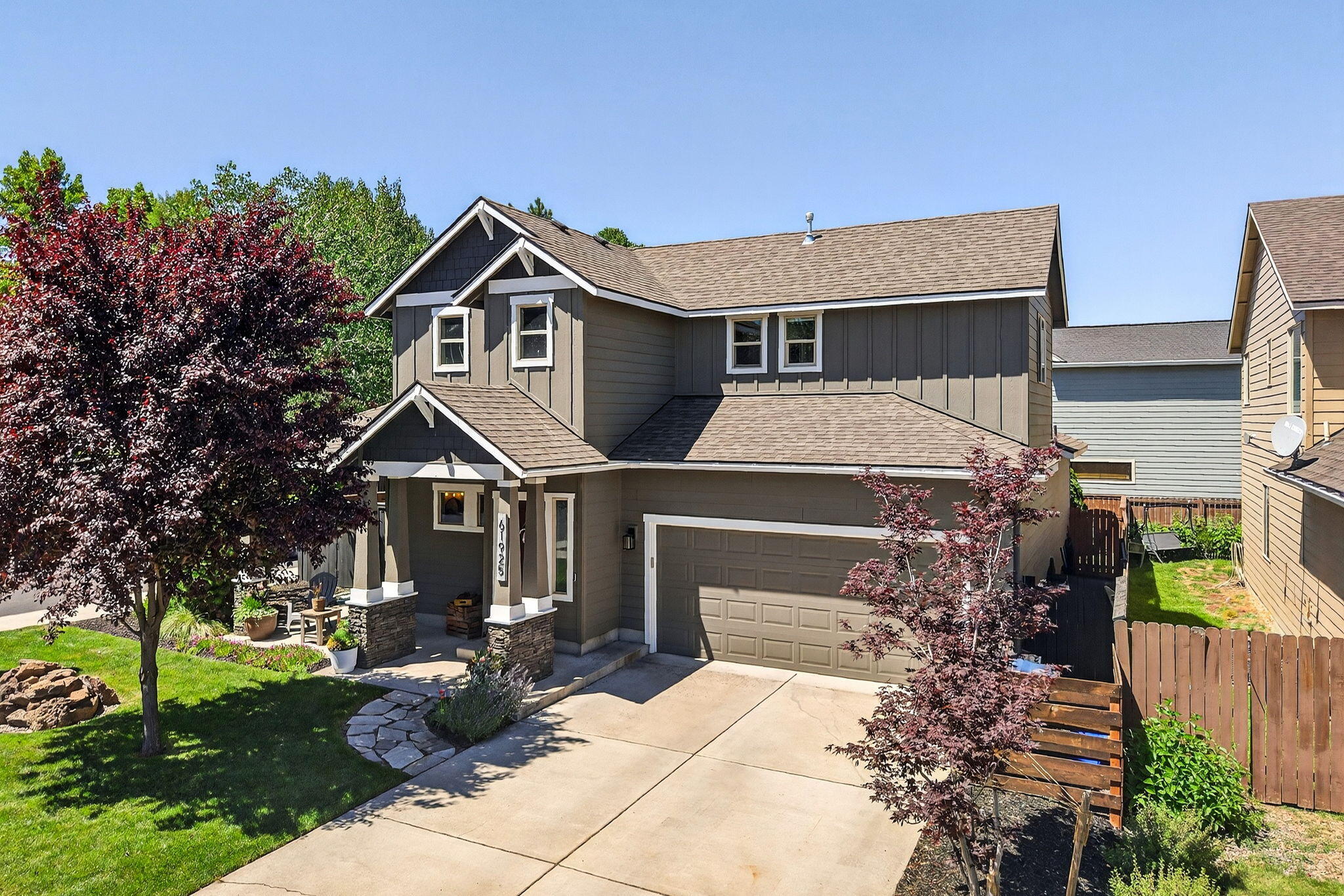 Welcome to this immaculately maintained home on a desirable corner lot in a quiet, friendly SE Bend neighborhood. Designed for modern living, this home features an open-concept layout with a spacious kitchen, large island, quartz countertops, upgraded stainless steel appliances, and a walk-in pantry. The main-level primary suite boasts vaulted ceilings, a walk-in closet, and a luxurious en-suite with dual vanities, soaking tub, and tiled walk-in shower. Also on the main floor: a convenient laundry room, and an additional half bathroom. Upstairs are two additional bedrooms and a full bath. Stay comfortable with central A/C and minimal electric bills from solar panels. The fully landscaped front and back yards include sprinklers in the front, and the private backyard  features a hot tub. Enjoy coffee on the covered front patio. Close proximity to St. Charles, schools, shopping, and restaurants. Don't miss this move-in-ready gem!
Recent updates: LVP flooring, carpet, & exterior paint!