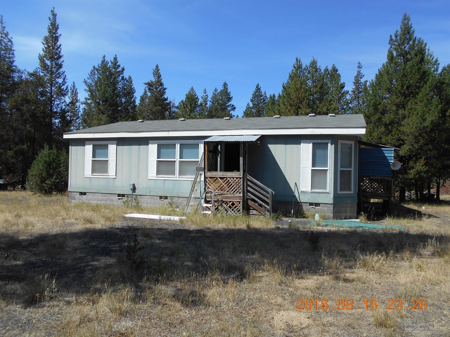 Nice starter home under 100K. Open bright floor plan with master bedroom separation. 3 bedrooms, 2 baths 1060 Sq. ft. all on 1 acre. Completely fenced and gated. All appliances included. Hurry this one won't last. Perfect for first home time buyers.
