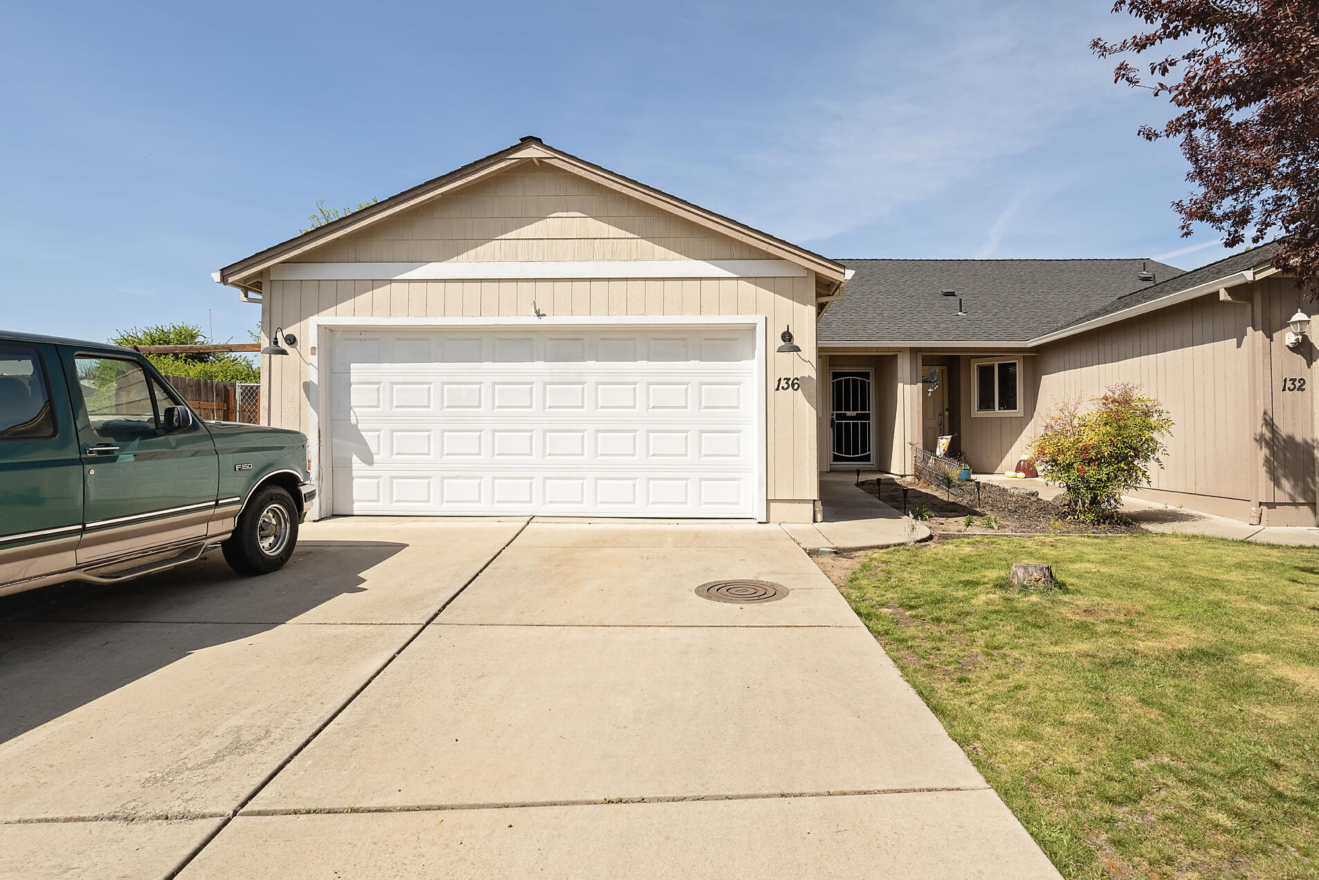 Affordable, easy care single level home in Eagle Point now available!  This 3 bedroom, 2 bath home with 1244 sq. feet built in 2007, has waterproof laminate flooring throughout (except carpet in two bedrooms). Kitchen with solid surface counters with rustic edge/backsplash, and all appliances stay. Open living/dining area with vaulted ceiling and ceiling fan with slider that accesses the covered patio/fenced backyard with sprinklers.  Master bedroom w/vaulted ceiling and ceiling fan, side by side closets, access to the patio, and ensuite bath. Both bathrooms have granite counters.  Two car attached garage and sprinklers front and back.  ...Welcome Home!