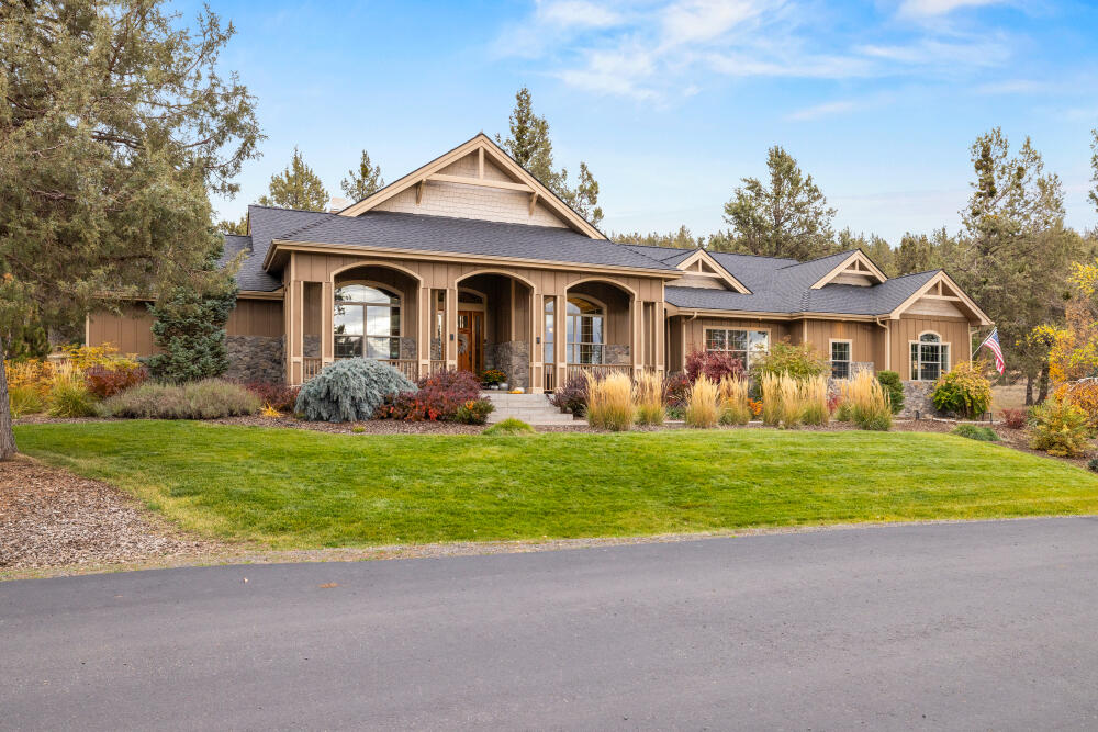 Custom built home in the gated community of Ridgewater, with a VA assembled at 2.25%. Feels like you walk into a mountain lodge, greeted with vaulted ceilings, exposed beams, wood paneling and a large masonry surrounded fireplace. The floor plan is the open great room concept and also features a nearby dining room that is open to the area, yet also separated with a few pillars to provide either separation, or still allow inclusion to the living room activities. Top of the line Wolf cook-top, oven, and Sub Zero refrigerator! The Hardwood flooring is in immaculate condition and the tile in the bathrooms and throughout the home is a sealed travertine. The den/office could easily become a 4th bedroom, and the primary suite has incredible tile finishes with a separate shower and soaking tub. Additionally there is a 3 car garage, private backyard patio, w/ covered BBQ area, and no neighbors behind to enjoy the views of the trees w/ privacy. This home is an absolute must-see!