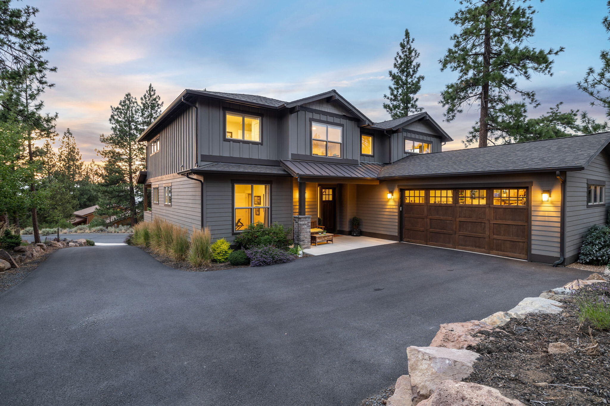 Nestled on the sun-drenched west side of prestigious Awbrey Butte, embrace luxury living in this exceptional Stone Bridge-built home. The expansive kitchen is a chef's sanctuary, with a massive center island and abundant storage/prep areas, making it an entertainer's delight. The integrated open living and dining areas are perfect for gatherings and showcase the amazing year-round sunlight.  The oversized 2nd-floor master boasts stellar mountain views and features a seating area, large walk-in closet, and a newly redesigned master bath with radiant floors. This level also includes a generous bonus space - perfect for a play area or home gym. A sizeable garage with workshop area effortlessly accommodates the needs of Bend's active outdoor lifestyle. View breathtaking sunsets from your private covered deck, perfect for unforgettable evenings. Convenience to excellent schools, downtown, recreational activities, and amenities make this home a perfect blend of comfort and accessibility.