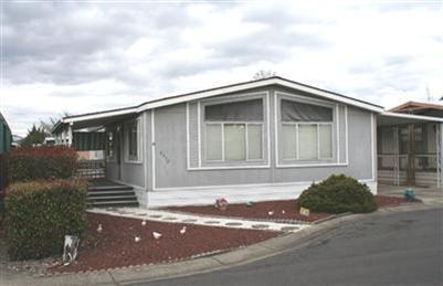 This is a move in ready home in a premier 55+ park. It is at the end of a quiet cul-de-sac. It has a newer roof and heat pump. Very low maintenance yard. Park has enclosed gated RV parking yard. Sellers are very motivated, bring us an offer. All measurements are approx. Information may be subject to changes.