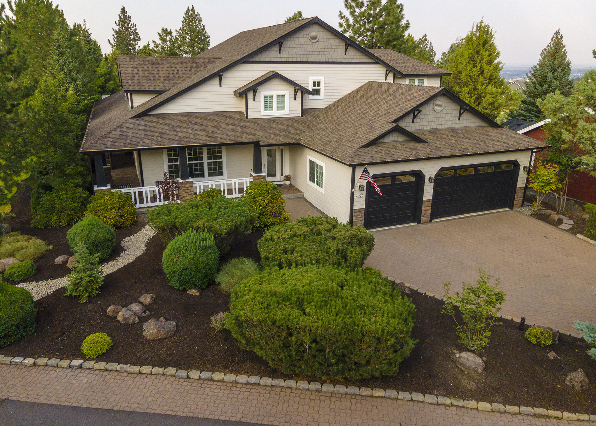 Welcome home to this beautifully updated property, exquisitely crafted to exude elegance and comfort in every detail. With a thoughtfully designed layout, the open living spaces create a seamless flow, ideal for hosting gatherings. At the heart of this executive residence lies the magnificent entertaining kitchen, adorned with tasteful finishes and fixtures, featuring a generous island and an array of amenities, including two dishwashers. This immaculate home boasts two large primary suites, one conveniently located on the main level, and another situated on the upper floor. The family room connects to a sprawling backyard patio, which offers an outdoor built-in BBQ and a cozy fire pit, all overlooking the 3rd fairway of the River's Edge Golf Course on a .46 acre lot. Call today to view this gorgeous home!