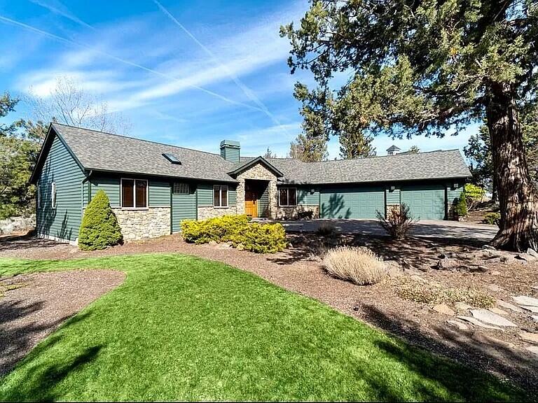 Located in NW Bend, this spacious single level home is in the desirable Awbrey Butte neighborhood w/ peekaboo Cascade MT. views. Situated on a large sunny 1/2 acre flat lot w/ mature landscaping. Beautiful paver driveway leads to finished oversized 3car garage w/ shop area & Epoxy floor. Inviting floor plan features spacious sunken living room w/ big windows/slider looking to back yard, large kitchen opens to vaulted formal dining room, separate open home office, large vaulted master suite w/ french doors in separate study perfect for nursery, office or home gym.  Large master bath w/ dual vanity, soaking tub, tile shower & walk in closet. Open kitchen features prep island w/ built in wine cooler, abundant cabinetry & stainless steel appliances.  Beautiful maple wood floors in kitchen and office. Wood burning gas fireplace, Covered rear deck overlooks private flat back yard.   House is very clean & Impeccably maintained inside & out!
