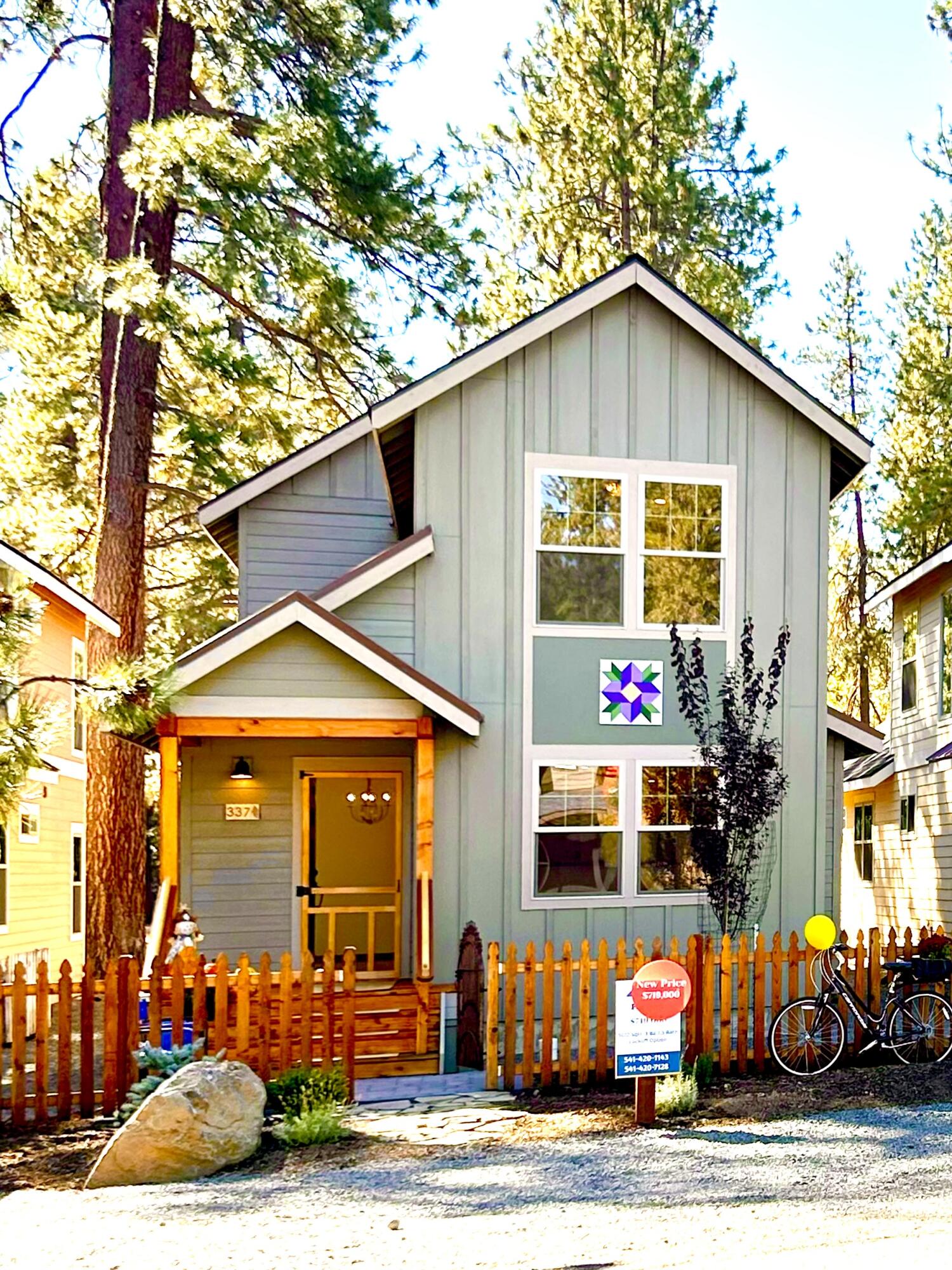 Newly built custom home in western-themed Sisters, Oregon. No HOA fees. Features a flexible floor plan with potential lock-off studio and private entrance—ideal for long-term rental. Main level includes tiled propane fireplace with granite hearth, Acacia wood eating bar, quartz countertops, custom Kibak tile, large pantry, and storage room. Powder room located away from living areas. Attached single-car garage. Upstairs offers plush carpet, custom stair railing, open loft/bonus space, two bedrooms, and a full bath with 6' soaking tub. Additional upgrades include solid-core doors, tiled step-in shower with Pebblestone flooring, heat pump, extra insulation, paver stone driveway/walkway, and vintage-style gate. $5,000 seller credit toward mortgage rate buy-down.