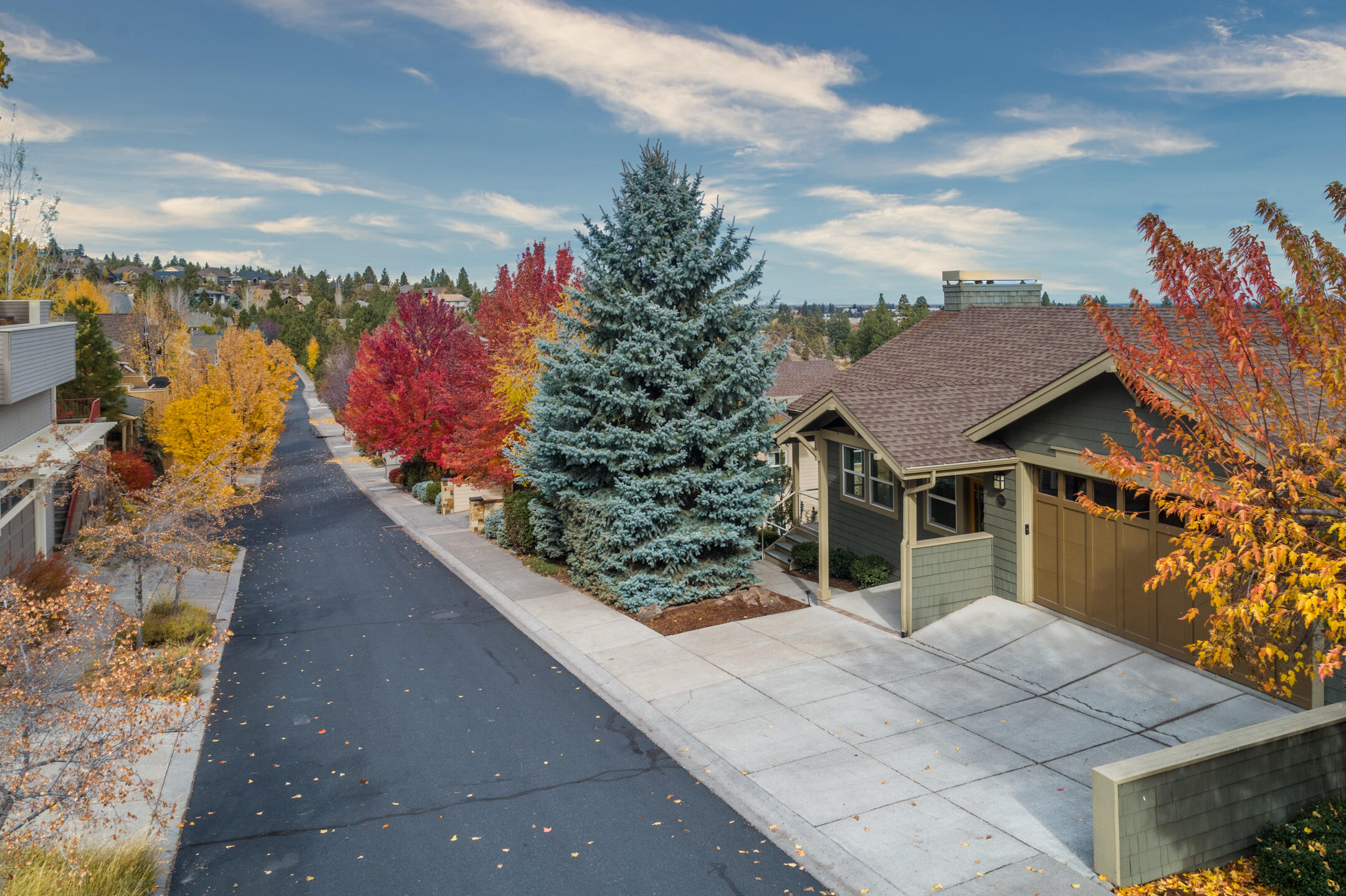 Unique Neighborhood, Perched above the Deschutes River with Outstanding Panoramic Views of the Deschutes River, Pilot Butte and Eastern Buttes. Private access tp the 
River Trail and within 1 mile of downtown Bend. Open Floor Plan, floor to ceiling windows providing great natural light as you enter the home. Custom Built Ins surround the gas fireplace feature, Hardwood floors throughout Upper floor overseeing the walk out deck with amazing views. The kitchen features new dishwasher, refrigerator and 
oven. Downstairs features, Primary Suite with Fireplace, Soaking Tub, Dual Vanities & Massive Walk-in Closet ,and private deck overlooking the river. Two En-Suites with Individual Full Baths allowing for privacy. Lots of square footage in the the lower level of home. Buyer can choose to keep as storage or finish out for more useable space. 
Loads of potential on this .45 acre parcel that Is on the River.