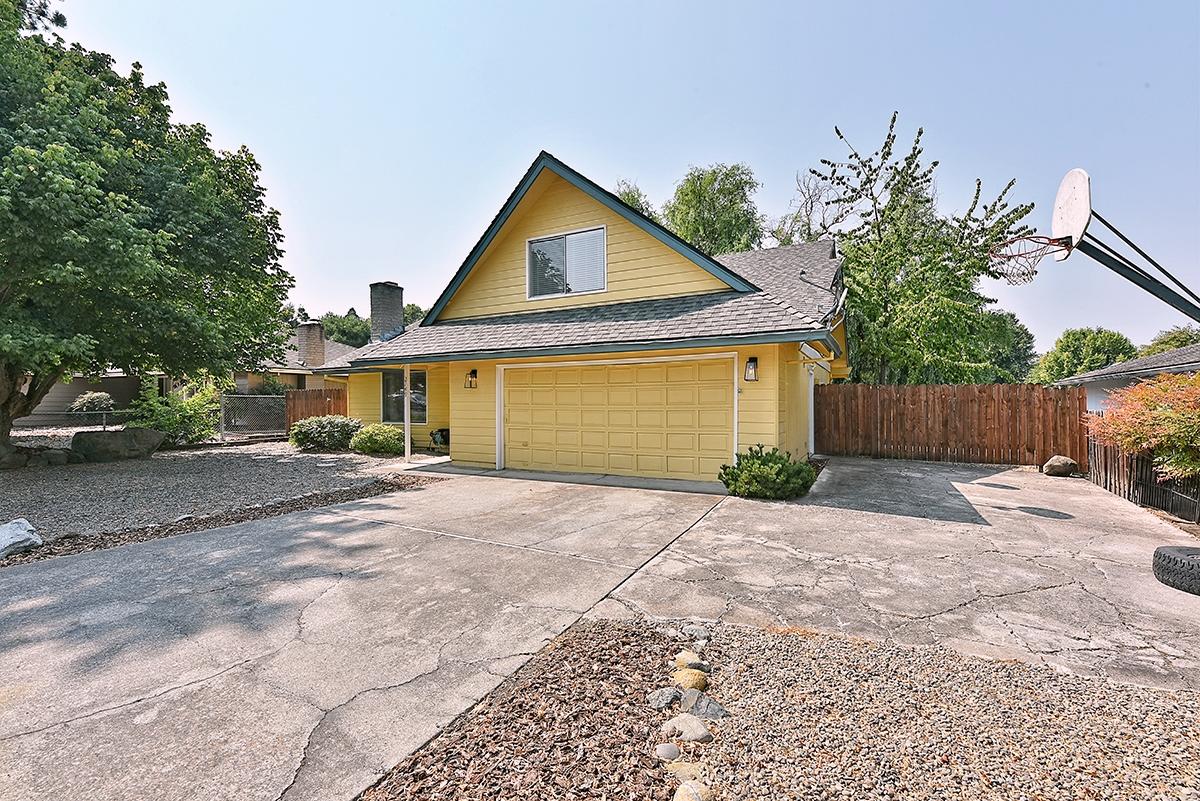 Trying to find a 4+ bedroom in the Abraham Lincoln School District? Look no further! Move-in ready! Come see this 5 very spacious bedrooms with versatile uses for remote classroom and home office, 2 bath and very roomy yard property with RV AND boat parking. You'll love the vaulted ceilings as you enter home; space feels open with lots of natural light streaming in! LR has accent wall and burl wood mantel over fireplace gives home a cozy feel. Balcony overlooks LR. Kitchen offers black marbled granite countertops, stainless steel appliances and more. Baths have granite counters and custom built vanities with fully extending drawers. Lots of closet space! Yard is low maintenance with lawn easily customizable to your dreams, with open shed, planting beds, mature trees incl a cherry tree! Work bench, lots of shelving on 3 walls, plus a pop out bonus area in garage. Upgraded features include water heater, HVAC, belt drive garage opener, and all the flooring. Call to see your new home!