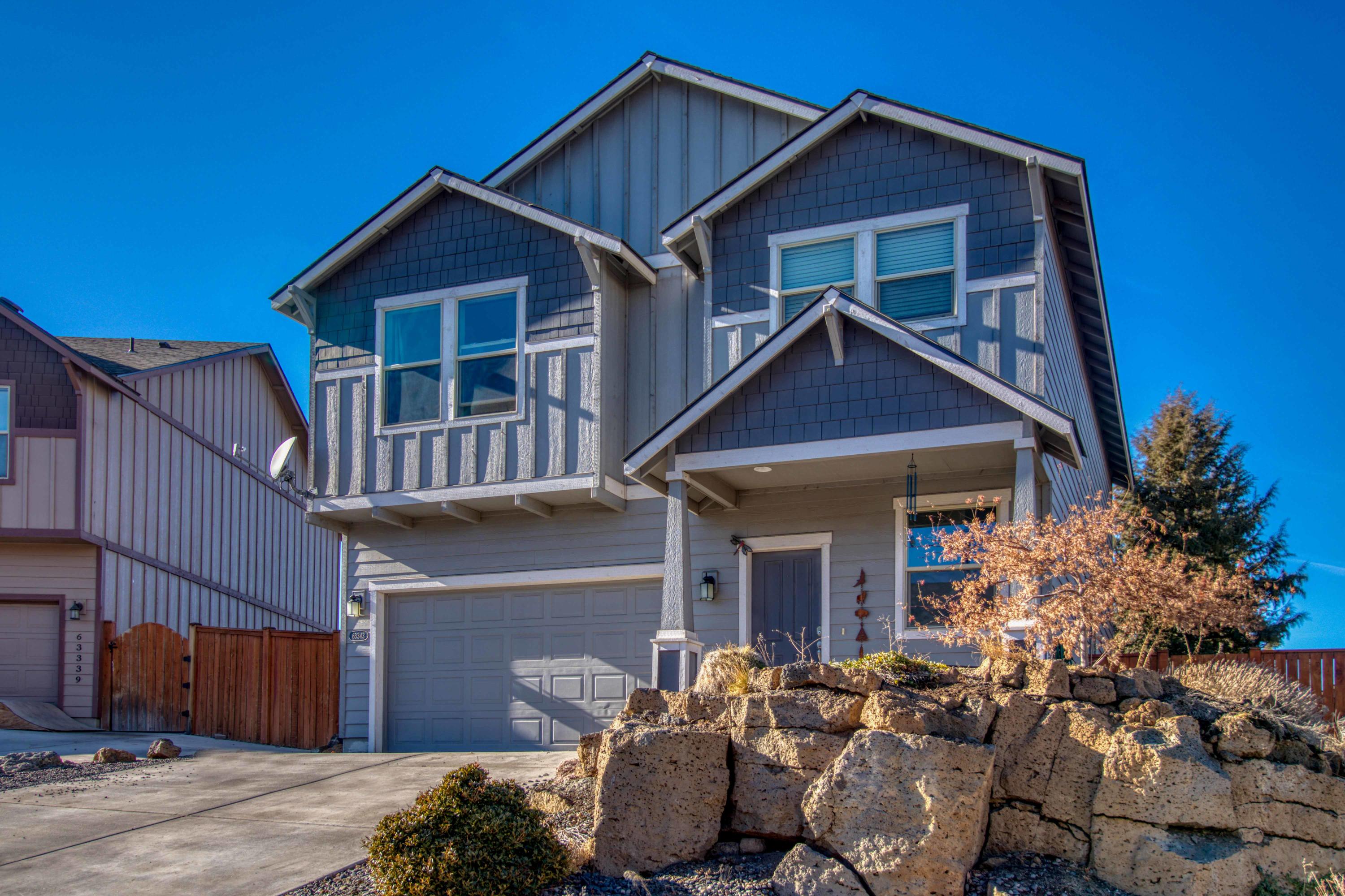 Beautiful two story home in an amazing NE neighbored near Rock Ridge park and Lava Ridge. This home boasts beautiful cascade mountain views from living room and views to the three sisters upstairs. Down stairs is open and bright with access out to a private patio and relaxing grass area. Upstairs has second living room, large master suite with walk in closet and laundry for your convenience. Make this gem your home.