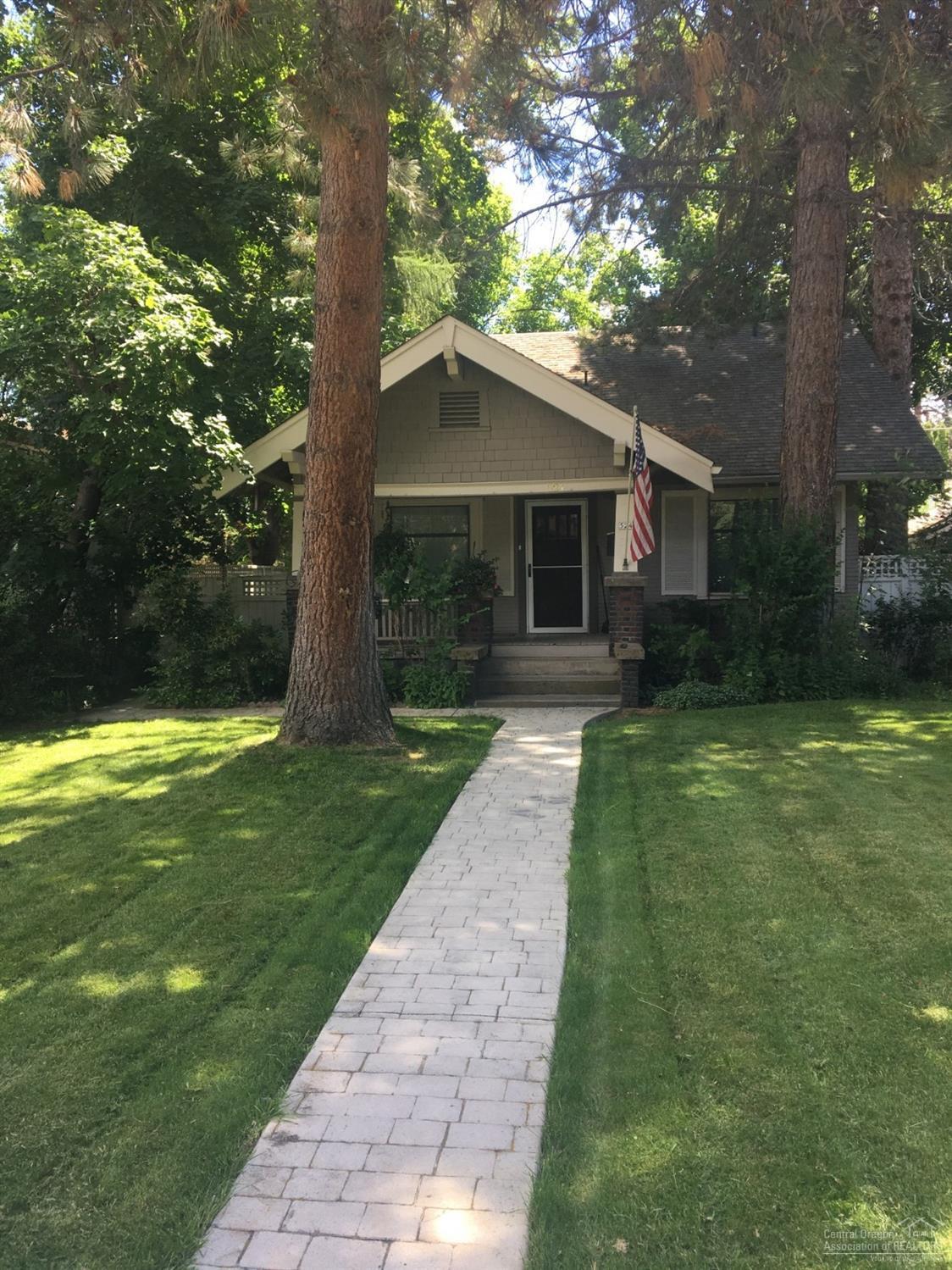 Beautiful home in the desirable historic district within walking distance to shops and dining in downtown and festivals in Drake Park. Historic charm of a 1920 craftsman home with inviting paver backyard and deck for an amazing entertaining space. Original doors and hardware, 800+ square feet of unfinished basement with a separate entrance, and a two-car detached garage make this property a wonderful home or fantastic investment property.