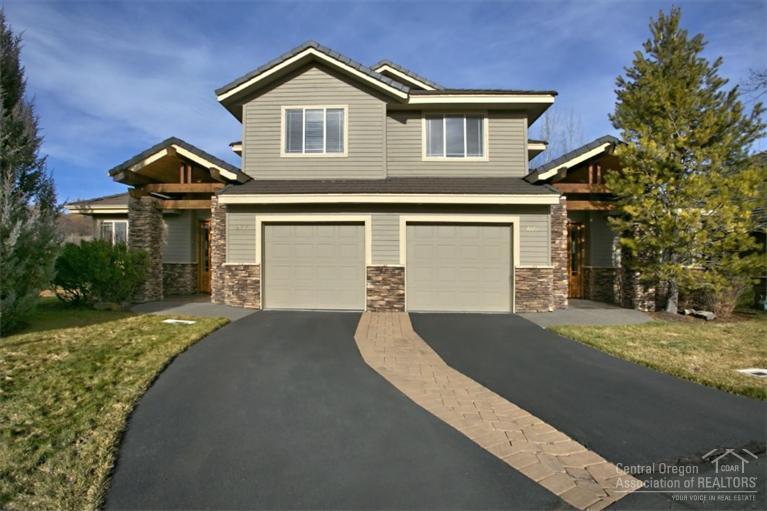 Very rare, updated and incredible townhome at Broken Top. End unit facing west with a deck that opens to a large grassy common area. Fresh paint, carpet, nicely appointed, open and bright. Each bedroom has its own full bath with lots of extra cabinets. Easy access to parks and trails, close to everything, yet very private.