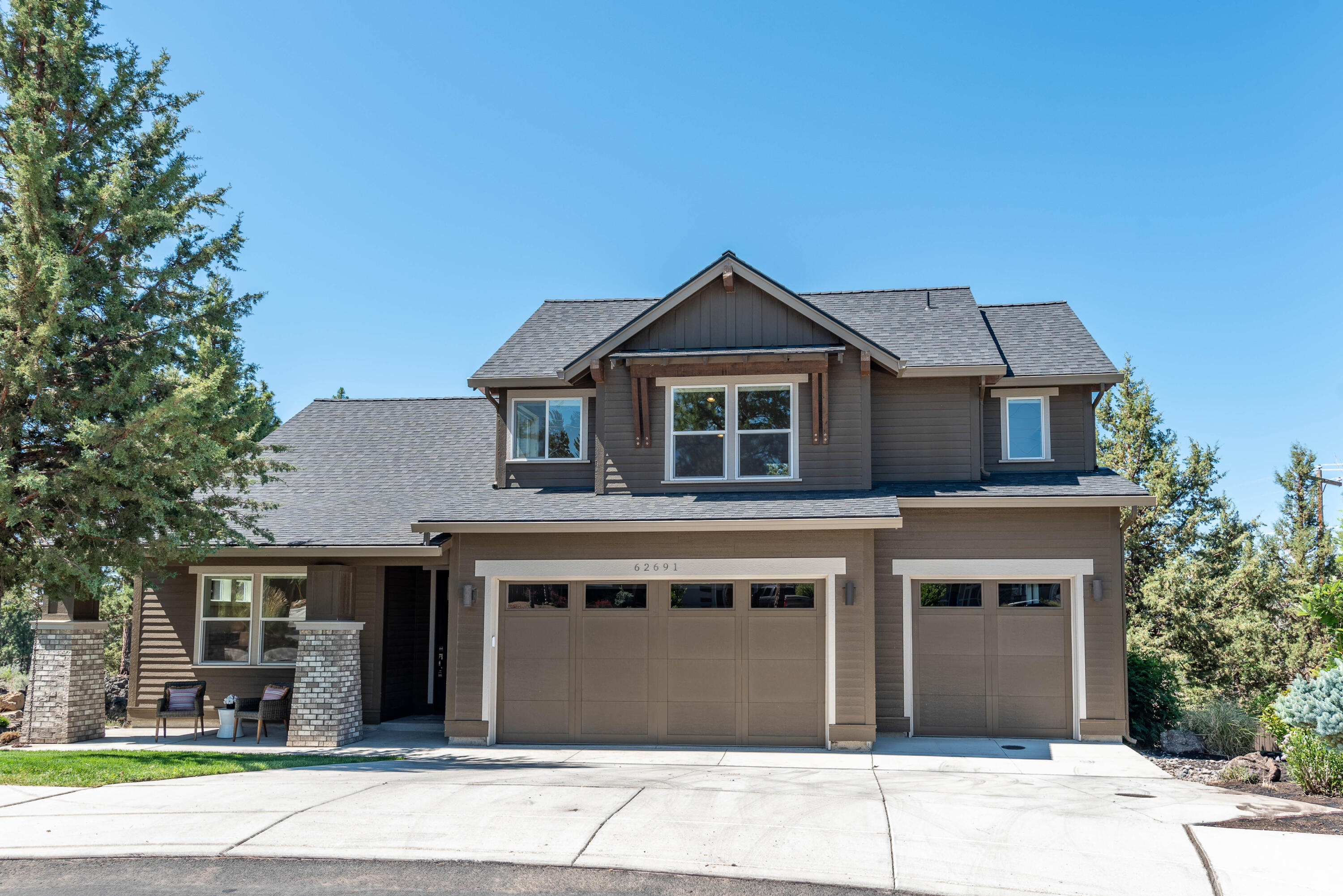 Unbeatable Westside Location with filtered Cascade views! This gorgeous 3,224 sq foot home sits on a .47 acre lot in desirable Shevlin Landing. This home has extensive upgrades including high-end GE Monogram appliances, custom kitchen, skylights, solar tubes and a covered paver patio with gas fire pit. The home boasts 4 bedrooms, 3 baths, an additional office (could be 5th bedroom), large bonus room, and a 3-car garage for all of your storage needs and toys. Easy access to Shevlin Park for hiking and biking and less than 2 miles from North West Crossing and the Newport Avenue and Galveston retail corridor. This property provides you with a little bit of elbow room while not sacrificing the proximity to everything amazing Bend has to offer. It's a spectacular find providing main floor living at its finest with 4th bedroom suite and bonus room on the second level.