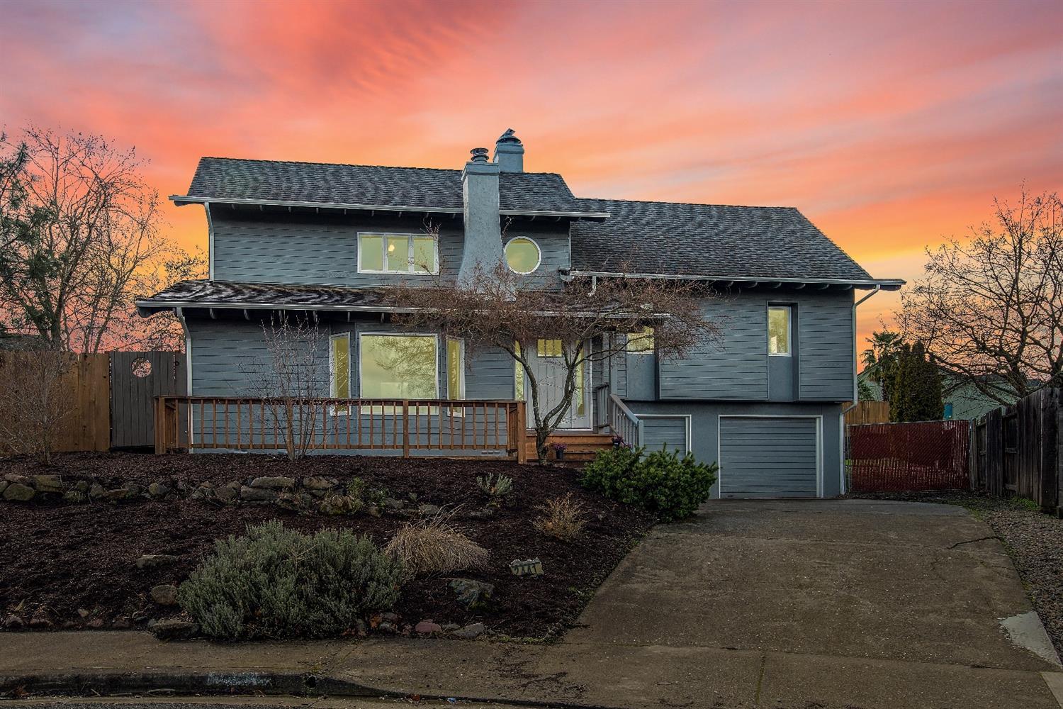 Back on the market! Newly remodeled home in an East Medford cul-de-sac. Inside you will find a gorgeous open kitchen with dark granite, white cabinetry, hardwood flooring, island, and stainless steel appliances. The living room has vaulted ceilings, a wood stove and hardwood flooring. You'll love the luxurious master suite with a fabulous claw foot tub AND tile surround walk-in shower! The home has a 2 car attached garage, RV parking plus a large back yard. A great feature of the home is the over sized, attached sun room with brick planters ready for a garden. There is new paint, new carpet and tons of character. This is a must see and it is ready to show!