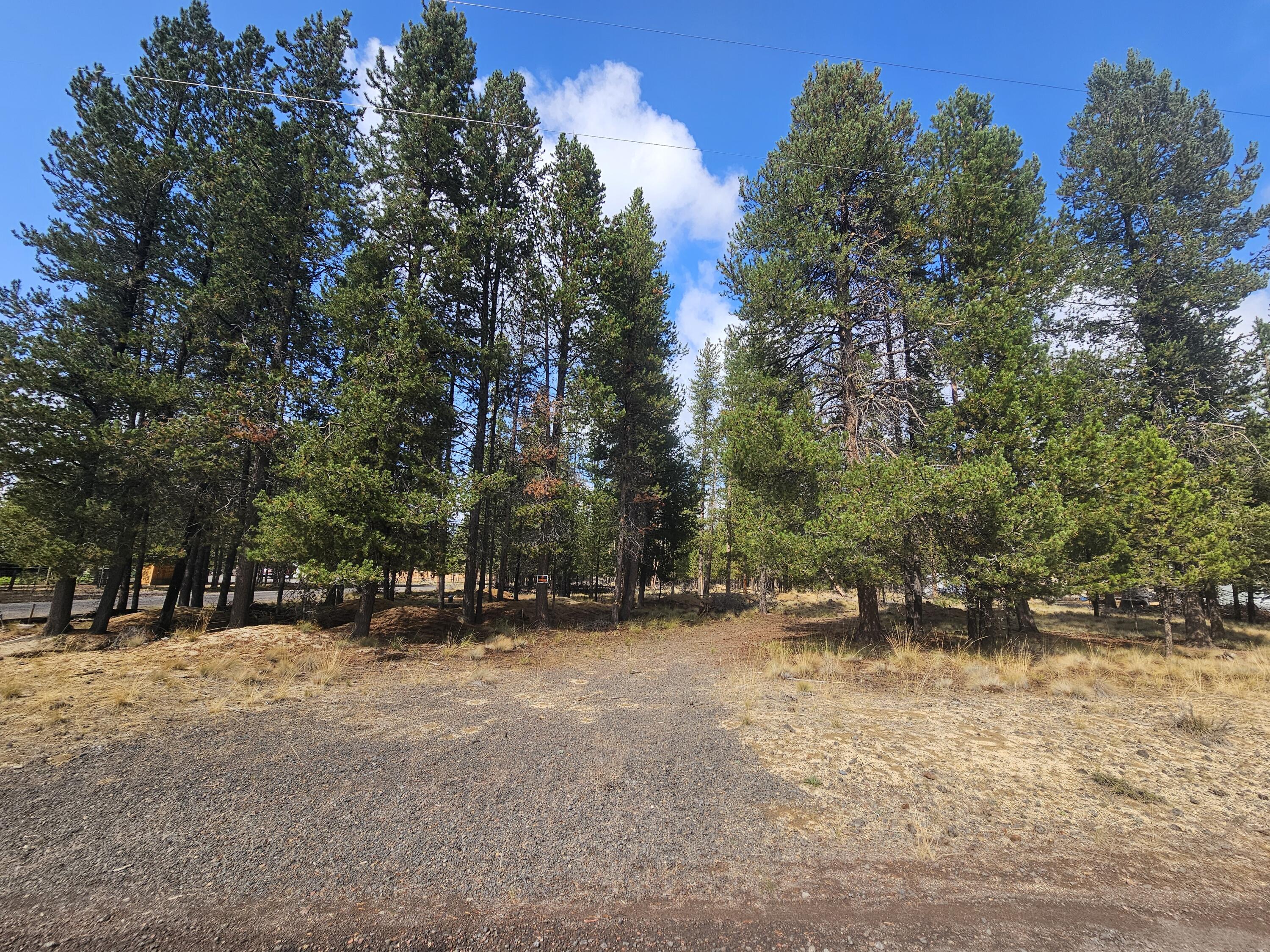 Discover your own slice of Central Oregon paradise with this spacious 1-acre parcel located in Sun Forest Estates. Nestled among towering pines, this level lot offers the perfect canvas for your dream home, vacation getaway, or future investment. Enjoy the privacy of a wooded setting while still being just minutes from the conveniences of La Pine, outdoor recreation, and local schools. Sun Forest Estates is known for its quiet atmosphere, wide-open skies, and easy access to year-round adventure—whether it's fishing and boating on nearby Wickiup and Crane Prairie Reservoirs, exploring the Deschutes National Forest, or heading to Mt. Bachelor for skiing and snowboarding.
With ample space for a home, shop, or RV parking, this lot provides flexibility to build the lifestyle you've been dreaming of. Power is available nearby, and the property will need a well and septic.
Whether you're looking for a peaceful retreat or a basecamp for all your Oregon adventures, this could be it! Come see