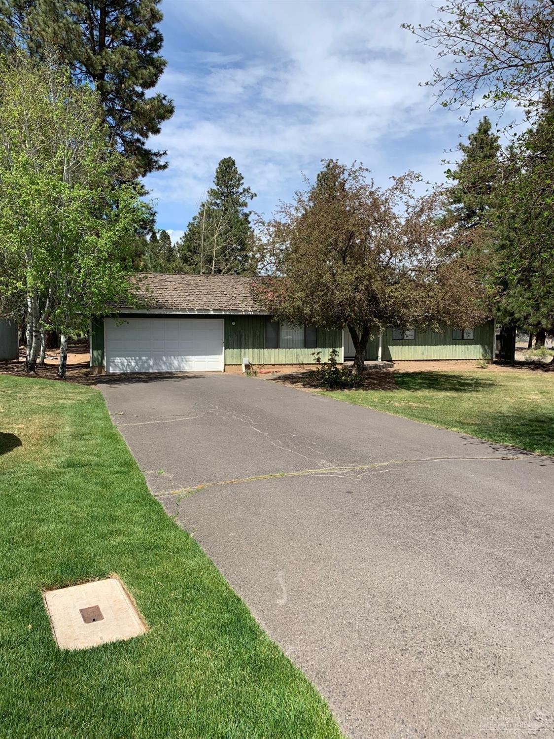 Much desired location, location on Bend's West side with so may amenities nearby! This home is priced so you may add your personal touches to make it the property you come home to with pride! Large parcels on Bend's West side are very difficult to come by and this is a keeper!