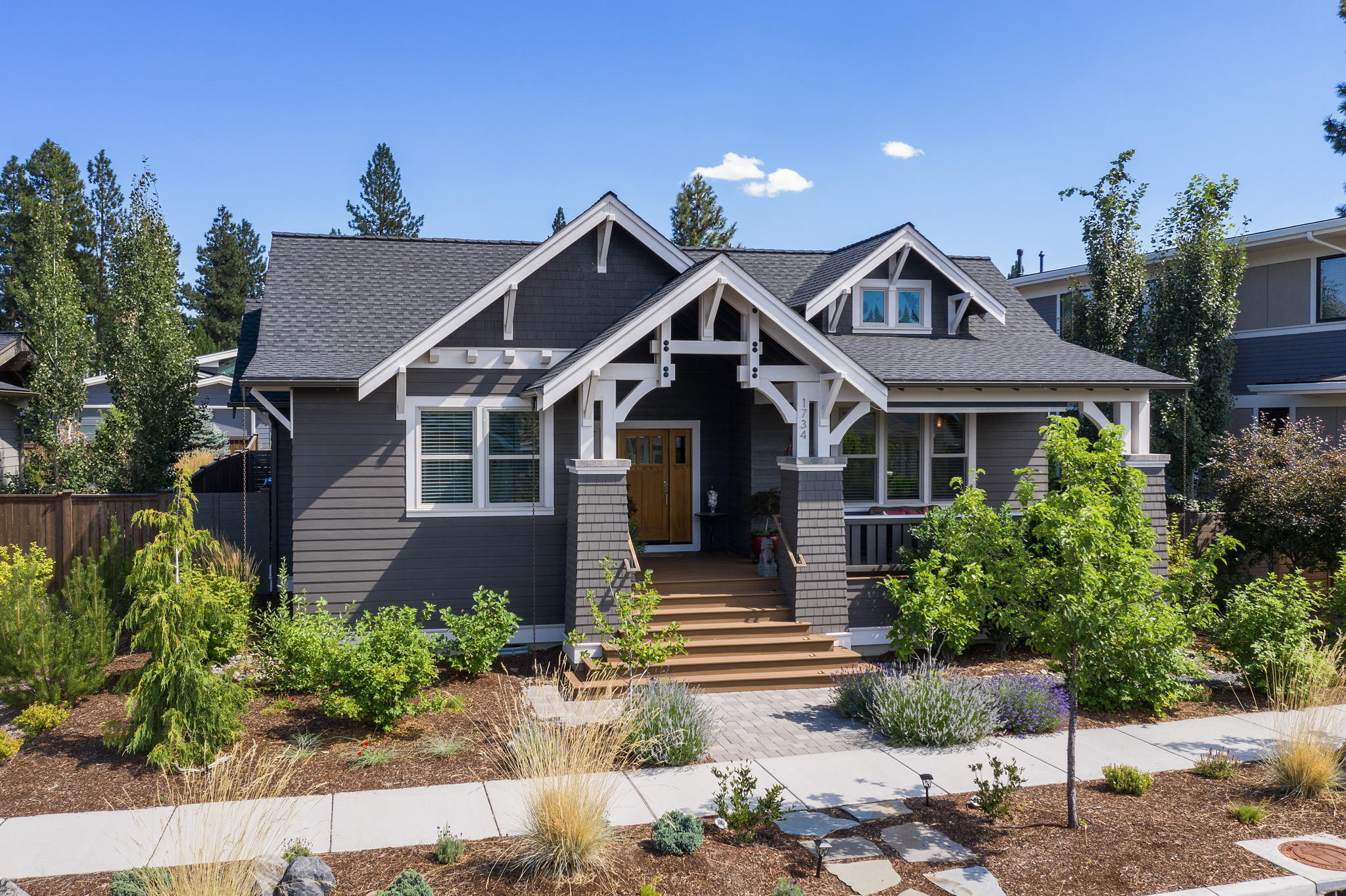 Better than new! This beautiful single level home in Northwest Crossing is a perfect fit for your Bend life style.  Fantastic location! Just 1 block to Discovery Park & close to the new Grove Marketplace, NWX Farmer's Market, restaurants, shops, schools, trails, etc...
Open concept floor plan with vaulted ceiling, stacked stone fireplace, beautiful windows, quality finishes and hardwood floors throughout. Gourmet kitchen with center island, quartz counters, JennAir SS appliances, and 2 walk-in pantries.  This home has 3 bedrooms, 2.5 baths, great storage and a lg laundry rm w/sink. Private primary suite w/lg tiled shower, dual vanity and huge walk-in closet. The spacious outdoor paver patio is perfect for entertaining or relaxing. You'll also enjoy beautiful sunsets with a mountain view from the inviting front porch. Low maintenance landscaping. You won't want to miss this beautiful home! Schedule a showing today or stop by the Open House Fri/Sat/Sun Aug 26-28th from 2-5pm.