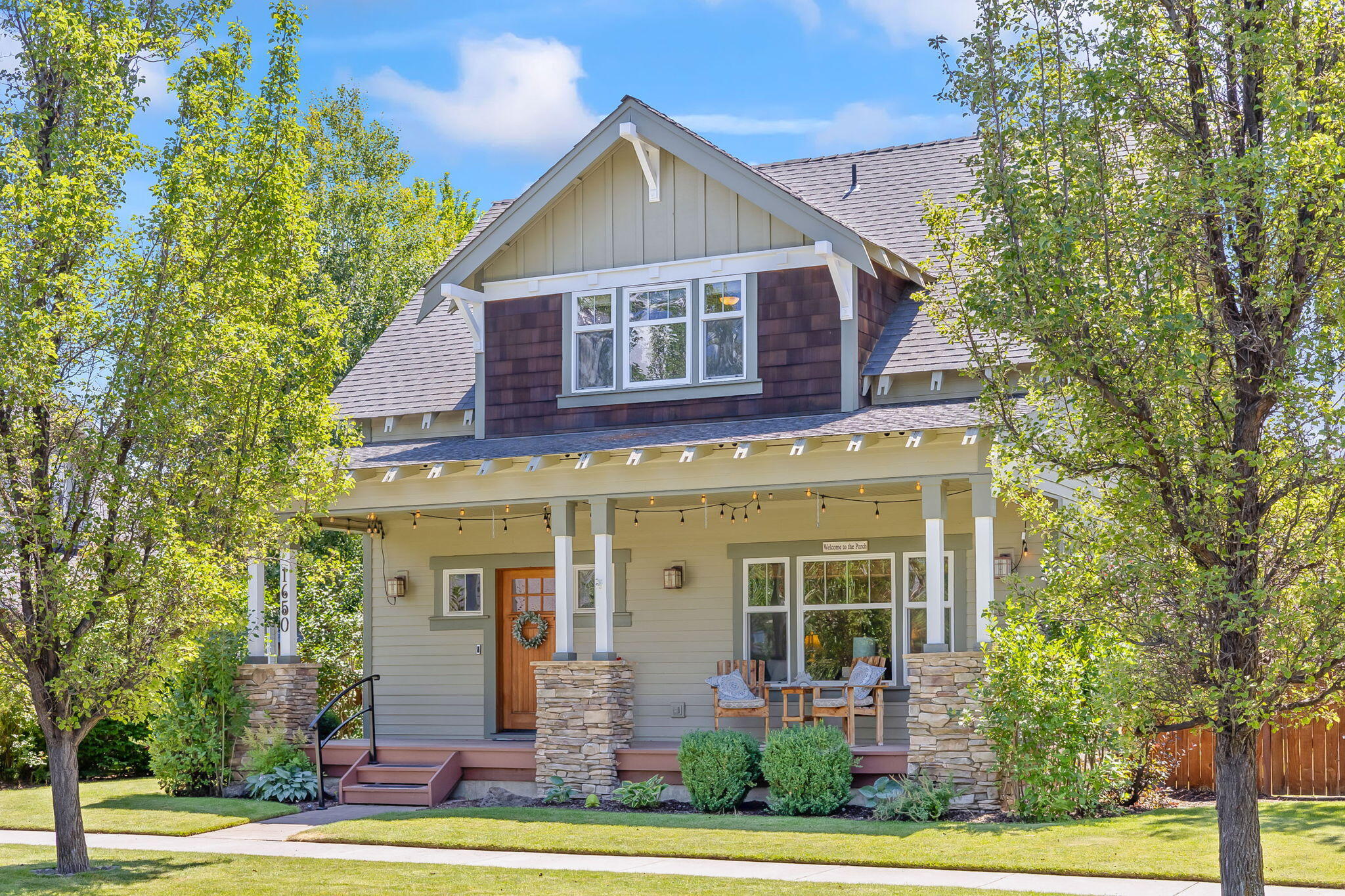 Step into this beautiful craftsman-style home in the highly desirable NW Redmond neighborhood of Canyon Rim Village. Offering 3 bedrooms and 2.5 baths, this home is just around the corner from the Dry Canyon with miles of trails, parks, and natural beauty to explore. Enjoy an oversized lot with alley access, RV parking, mature trees, and charming covered front and back porches—perfect for relaxing or entertaining. Inside, the spacious kitchen features a large pantry and ample storage throughout the home. Located on a quiet, tree-lined street, this inviting property truly feels like home.