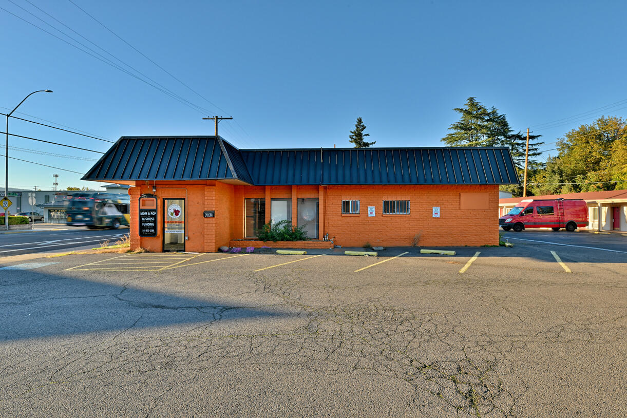 Prime Commercial Opportunity in Excellent Medford Location!
Situated on high-traffic South Riverside Avenue between Earhart and Twelfth Streets, this versatile commercial property offers outstanding visibility and easy access for customers and deliveries. Currently configured as a fully operational restaurant, the space features two spacious dining areas, abundant natural light, and a professional-grade kitchen equipped with a walk-in cooler, stainless steel sinks, and an overhead hood with fire suppression system. Zoned C-G (General Commercial), this property allows for a wide range of uses—offering endless opportunities for restaurants, retail, office, or mixed-use development. Excellent signage and frontage maximize exposure on one of Medford's busiest corridors. Owner Carry possibility with $100,000 down.