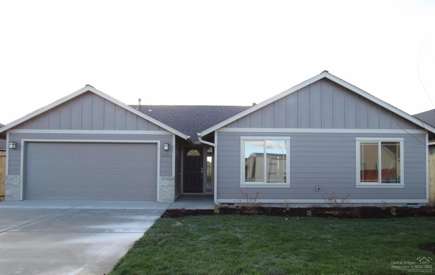 100% complete in Redmonds Crane Meadow. 3 bedroom, 2 bath home, 1527 sq.ft. of living area. Large Great Room with gas fireplace opens to Dining and Kitchen with eating bar. Knotty Alder cabinets with quartz slab counter tops, all stainless appliances. 30 year roof, forced air gas that is AC Ready. Separate utility room. Double car attached garage. Landscaped front and back with sprinklers and fencing. Single level home with great curb appeal.