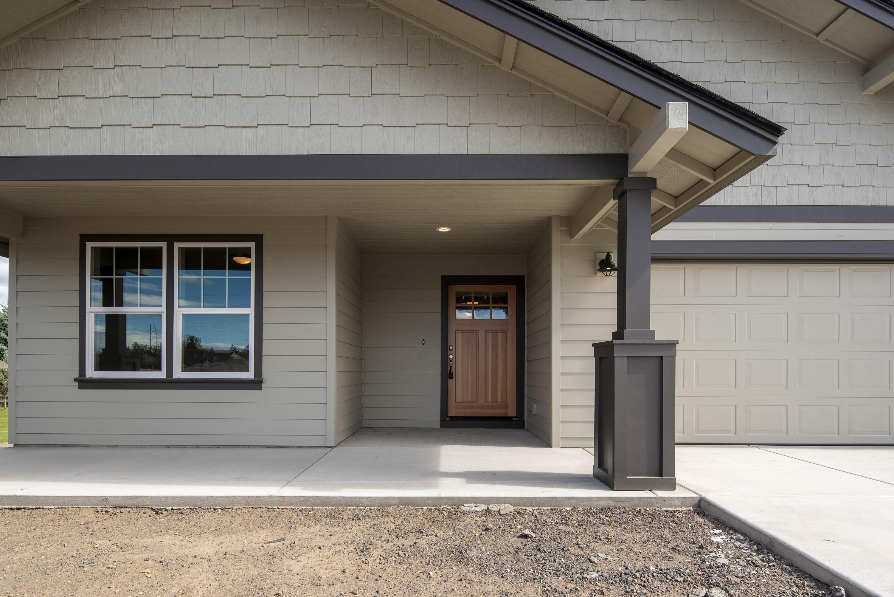Spectacular views from Bachelor to Mt. Hood to Smith Rock from this brand new Wood Hill Homes community. Conveniently located along the western edge of the city limits this neighborhood offers a countryside backdrop w/ easy access to Sisters, Bend, and downtown Redmond. Single level homes, 3 bedroom 2 bath, attractive light & bright floor plans w/ open great room concept. Vaulted ceilings, laminate flooring throughout main living space, gas fireplace w/ tile surround, insulated interior walls, pantry (per plan), stainless steel appliances including gas range, quartz counter tops. Double vanity sinks in master & walk-in closets. Lap siding, fully fenced back yard, covered back patio, front yard landscaping w/ underground sprinklers.