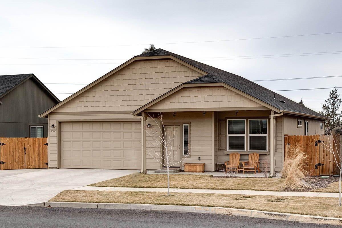 Beautiful, like-new home conveniently located in NE Bend. This wonderful, single-level home features A/C, boat/toy storage area, designer paint, extensive landscaping upgrades with fire pit (piped for gas), and more! Enjoy mountain views from the open great room or relax with friends on your paver patio. This is a must see!