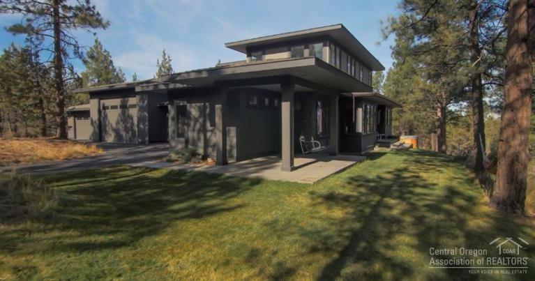 Custom home on an extremely private 8.08 Acres just past Aspen Hall on Bend's coveted West Side. That's right over 8 acres of pine tree covered property bordering Tumalo creek and Shevlin park with direct access to the trails in Shevlin Park. There is nothing else like it available this close in. It gets better, newer custom built contemporary prairie style home with 2708 sqft and almost 3,000 sqft of heated attached garage space. Listen to the sounds of Tumalo creek from your private covered porch.
