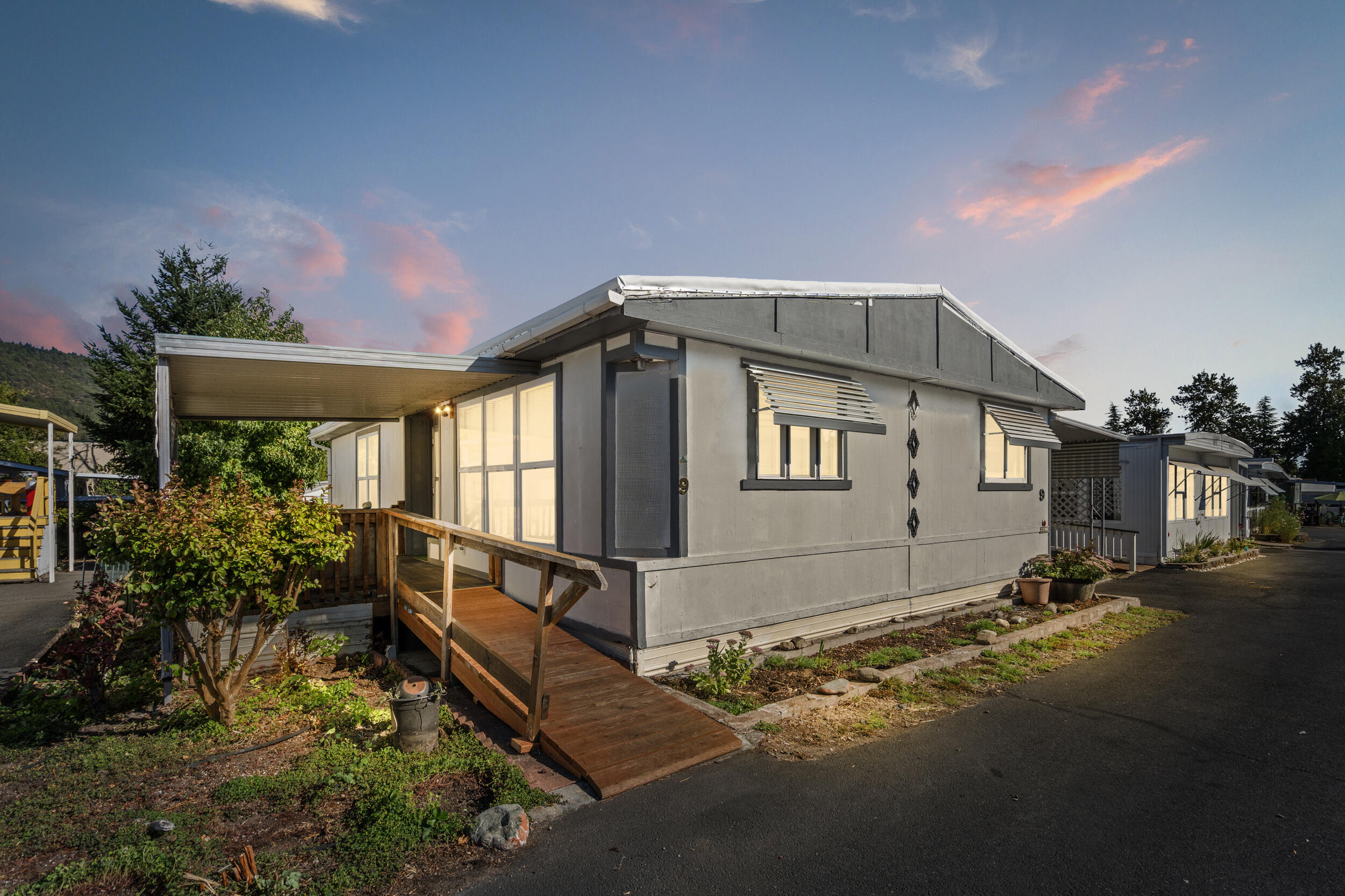 HIGHLY MOTIVATED SELLER, BRING ALL OFFERS! New Roof installed in July of 2025! Your new home has some serious CHARM! Located in the desirable 55+ Country View Mobile Home Park, this 2-bed, 1-bath home offers a smart layout with updates throughout and a surprising amount of space packed into 960 sq ft. The yard is incredibly charming, perfect for gardening, relaxing, or transforming into your own private little oasis. In addition to the garden shed, behind the carport, you'll find a large, well-built workshop with power already in place, ready for projects, hobbies, or extra storage. It's an excellent setup in a pleasant, well-maintained community. There is no need to keep house shopping, you have found HOME! Space rent is $720 per month and includes water. Schedule your showing today!