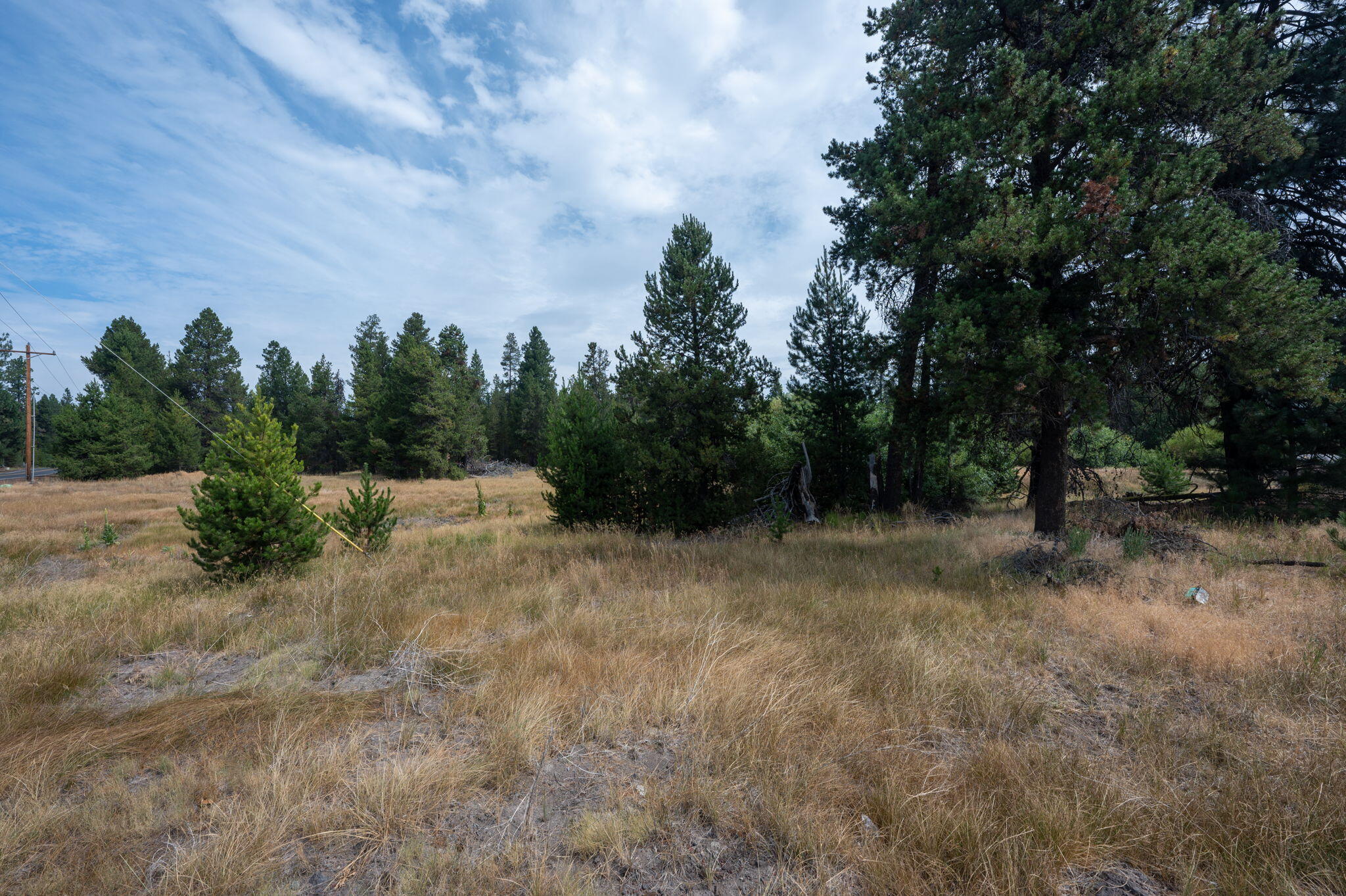 Beautiful 1/3 acre flat lot ready for your  next home or vacation spot. With river access just across the street this lot is private and full of potential. Owners in the area have created parklike settings and this one will be amazing with your vision! Close to the highway 97 corridor, local Snowpark nearby and just off a beautiful Oregon Scenic Byway it could even be used as a recreational property with full hook ups! Buyer to do all due diligence on land use approvals. Check with the county on possible uses on the property. Owner carry is not an option.
This is a corner lot and lot right next to this one is also available.