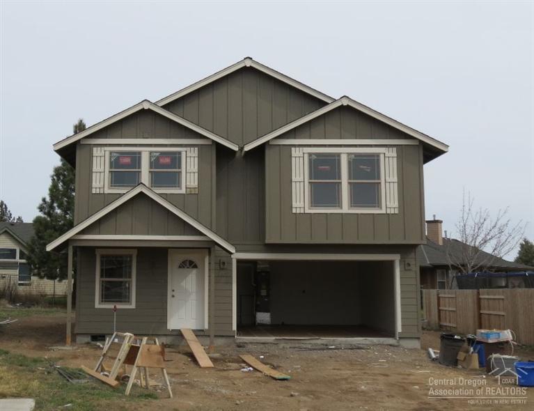 Brand new home is located in SW Redmond's neighborhood of Julina Park. Featuring 3 bedrooms, 2.5 baths, large master suite with huge walk-in closet, double sinks and shower. Kitchen offers an abundance of Knotty Alder cabinets, a large island with eating bar and a separate dining room. The front yard is landscaped with sprinkler system, double car attached garage. The home is new and vacant and located in SW Redmond for easy access to Bend.