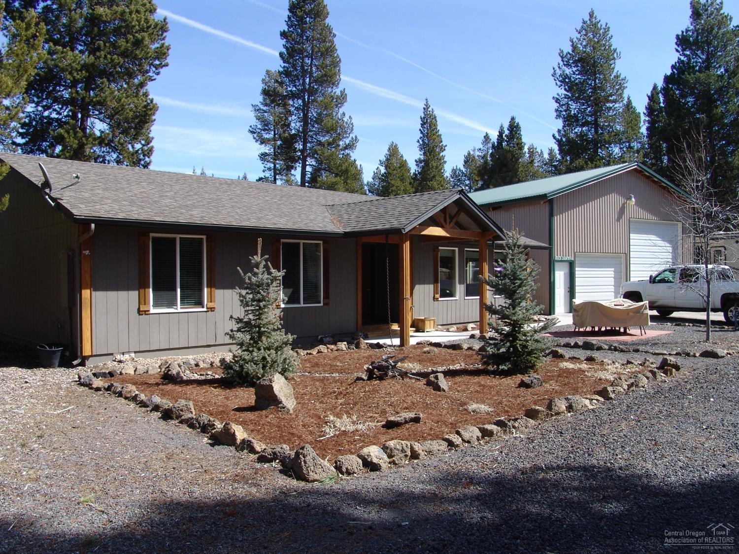 Check out this great 3 bed/2 bath home 1704 with 1 + or - fully fenced and gated acre property in a great location. Property backs to BLM for extra privacy! Home has an updated kitchen and living area and is clean and move-in ready! This single level home is wonderful for entertaining with landscaped front and back yards. Also features a 30 x 40 RV garage/shop with lots of storage, workbench, insulated, large double-door and side door.Close to Rivers, Trails and Much More!!