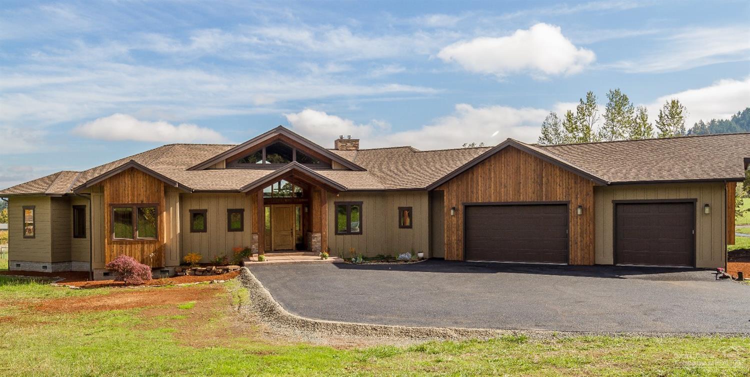 Welcome to your dream home on 5 acres! This is a must see. 4 bedroom 2.5 bath, high end finishes throughout the home, rustic pine floors, alder doors, granite, double walk in closets in master, central vac, induction cook top, 9ft garage doors, rv plug in. Approximately 1,600 sq. ft. of customizable unfinished basement plumbed and wired. Beautiful view of Mt.Pisgah. Great location 10 minutes to downtown Eugene. Bring your animals. Room for shop or barn.