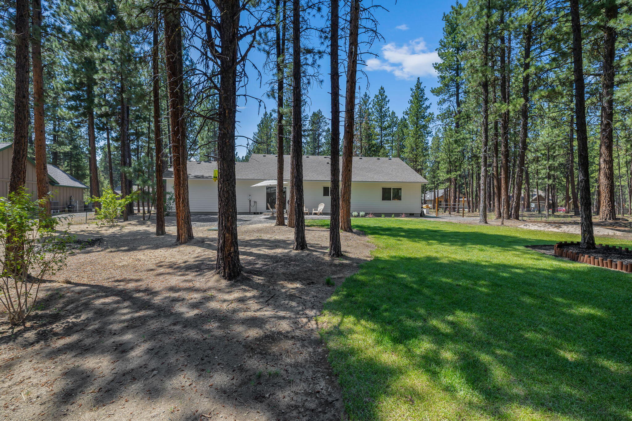 Welcome to Deschutes River Acres—a quality, friendly community that's just a stone's throw from the Little Deschutes River. This beautiful 2021-built home has it all: a brand-new ATT septic system, new well, water filtration system, hybrid water heater, double-pane vinyl windows, and an energy-efficient all-electric HVAC system for cool summers and cozy winters.
The whole-home water filtration ensures you've got clean, healthy water from every faucet. The backyard has a beautifully landscaped lawn area with tons of space for kids and dogs, or a quiet spot to relax under the pines. The circular driveway makes parking a breeze, and there's plenty of room on this .43 acre lot for trucks, boats, and all your outdoor toys.
With all these features and modern infrastructure on a half acre, a new build like this would cost much more than the listing price—so why wait? 
The work is done, and it's move-in ready.