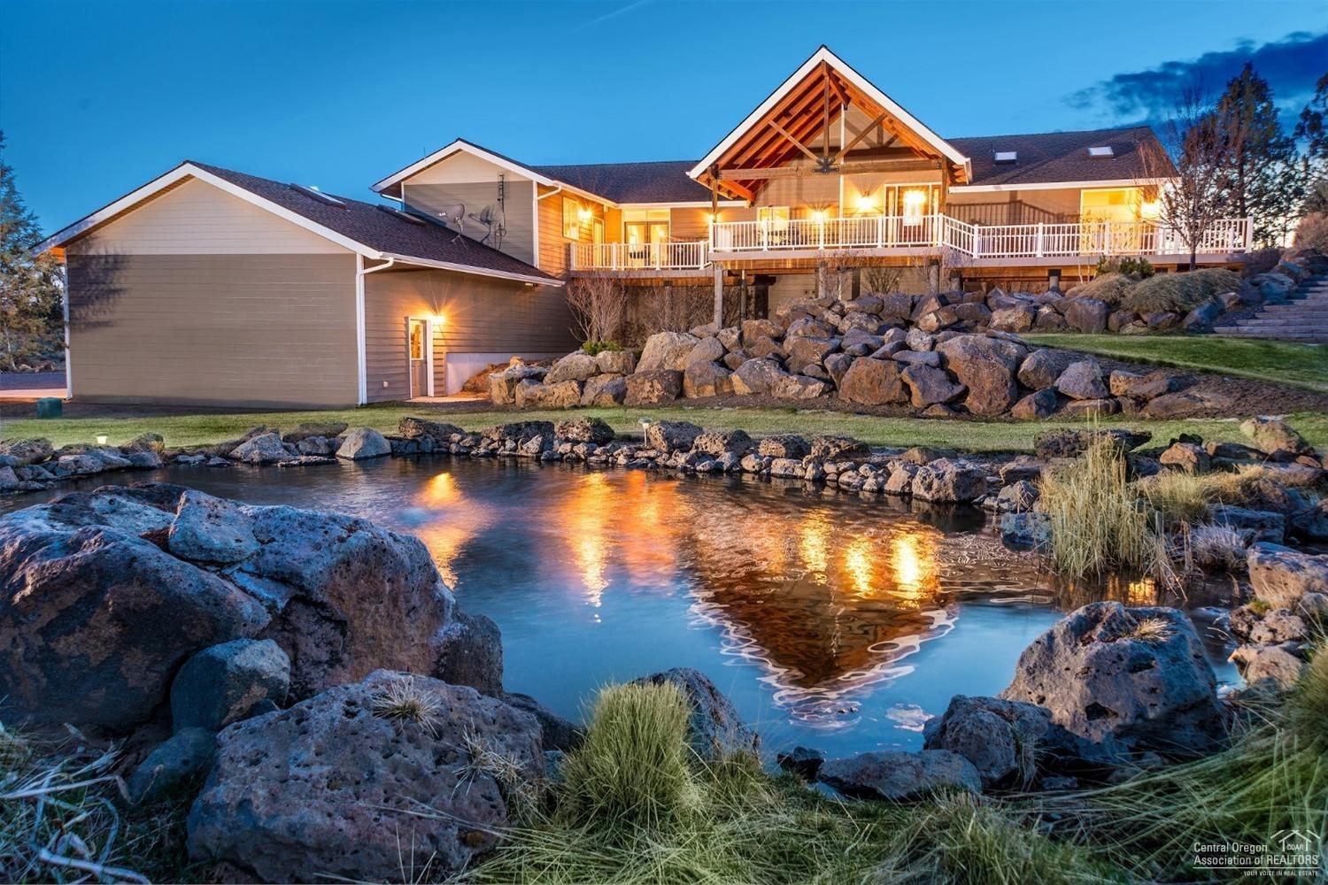 Epic 3-Sisters & Broken Top view from every living space in this grand great-room designed NW lodge-inspired home on 10 Acres. Extensive built-ins throughout. Gourmet kitchen with expansive island and pantry pull outs. Master on-suite features walk-in shower and soaking tub. Multi-generational living potential downstairs with full kitchen and family room with fireplace. Huge heated shop connected to main house and oversized heated 3-Car garage. Easy care landscaping with beautiful raised-bed garden.