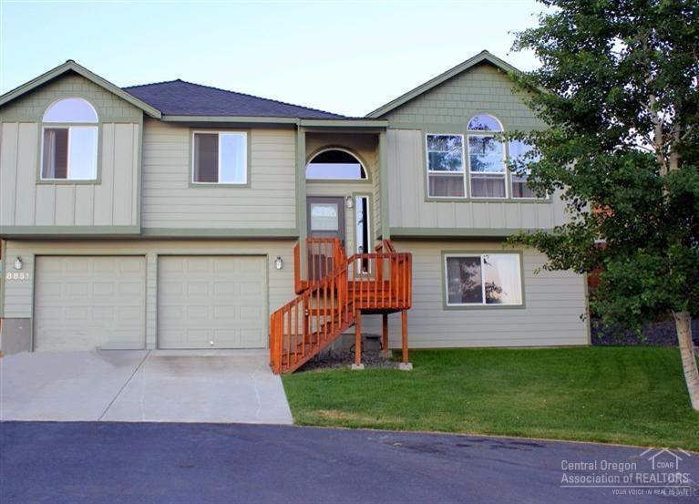 At the top of the neighborhood and resting halfway up a large butte, this home features 4bdrms, 3baths, plus a bonus room. Expansive views of Smith Rock from your living room, bedrooms, and backyard with new carpet and paint throughout the interior. Extremely private and completely fenced back yard with natural rock wall, and a large patio for outdoor entertaining. Great location, approx. 5 miles to St Charles Medical Center, Home Depot and Starbucks.