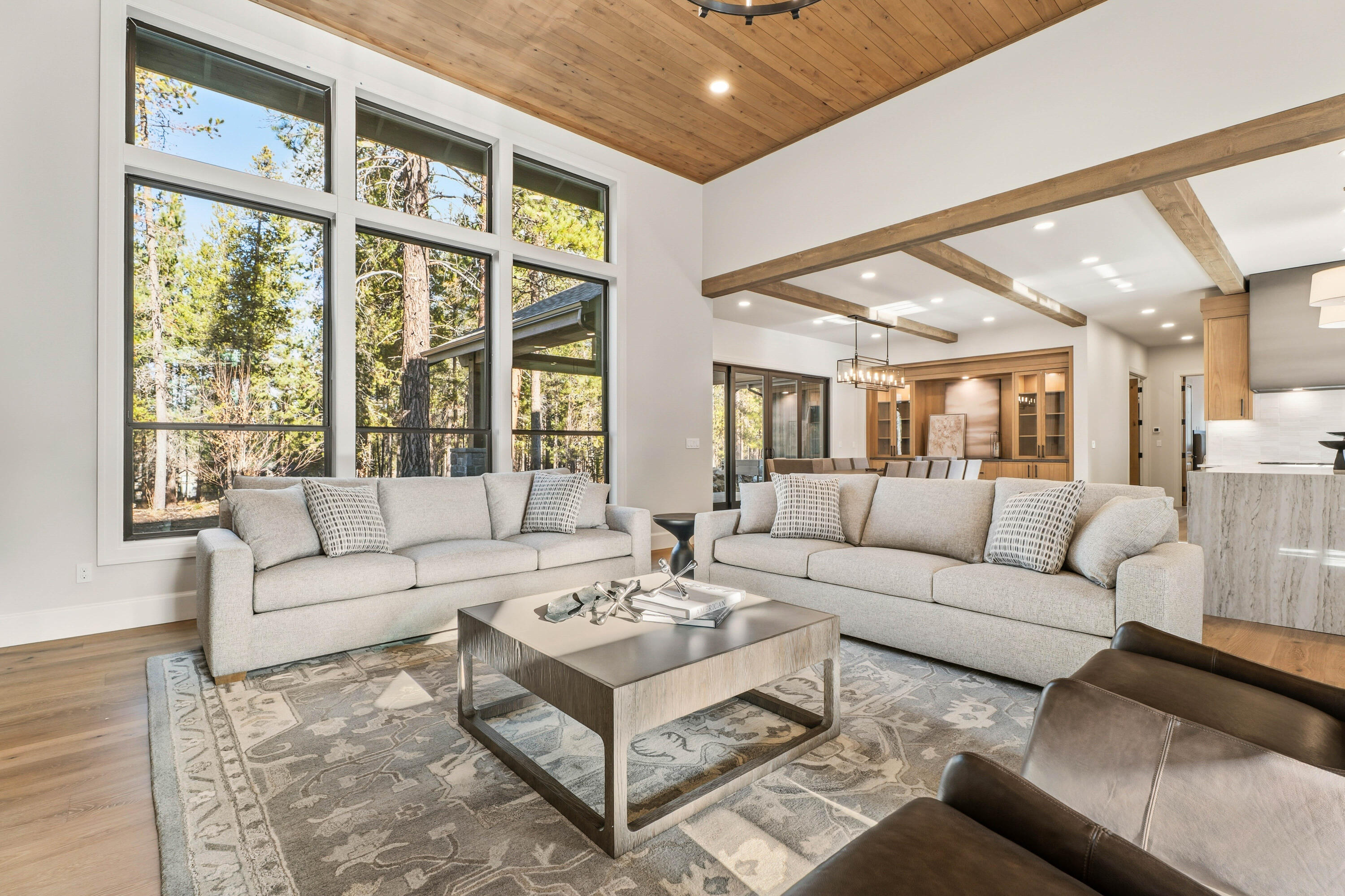Discover the perfect retreat in Caldera Springs—designed for those who crave comfort, elegance, and the outdoors. This beautifully furnished home is nestled on scenic Cottontail Loop, one of the community's most exclusive and peaceful settings. Step inside to find an airy, light-filled layout where the great room, bonus room, and gourmet kitchen come together for effortless entertaining and everyday living. Thoughtful finishes, inviting fireplaces, and expansive glass doors invite you to unwind in style. Step outside to your private outdoor haven, complete with a sunken hot tub and over 600 square feet of covered and uncovered patio space—ideal for dining under the pines or soaking in the stars. Whether you're looking for a year-round residence or a seasonal escape, this exceptional property offers the best of the Sunriver lifestyle.