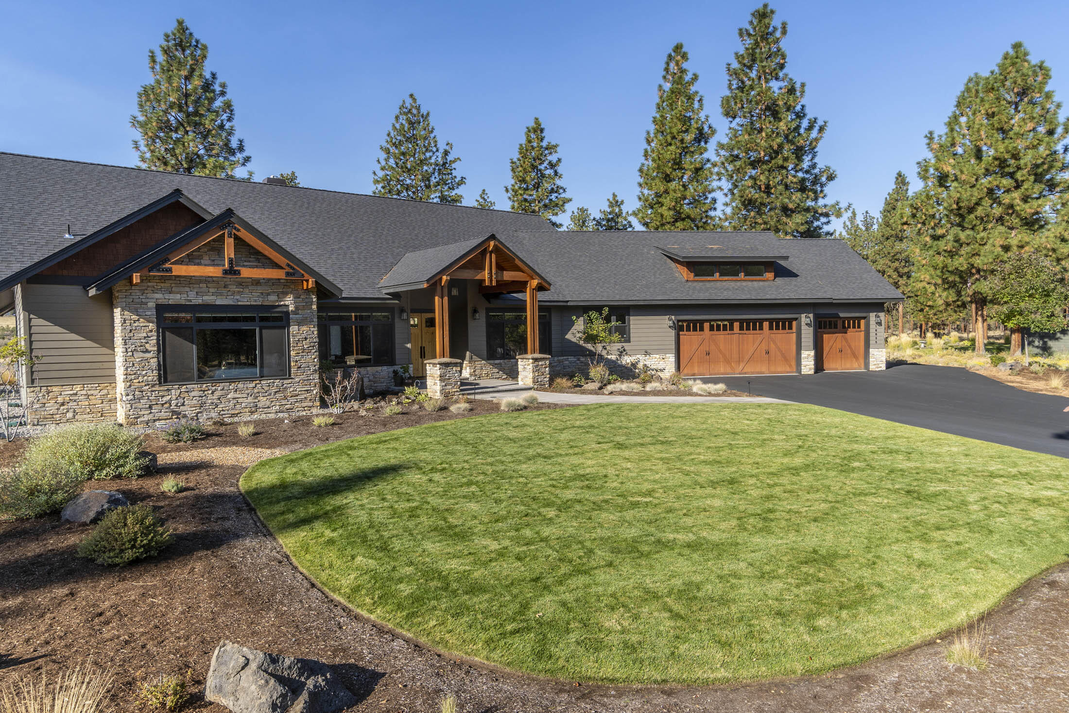 Incredible craftsmanship, sweeping views and a quaint neighborhood help define the magic of this entertainers' dream home. The vaulted great room, spacious adjoining ''chefs'' kitchen with WOLF appliances, large walk-in pantry, radiant floor heating in the bathrooms, heated oversize 3-car garage, contribute to making this ''one extraordinary home''!